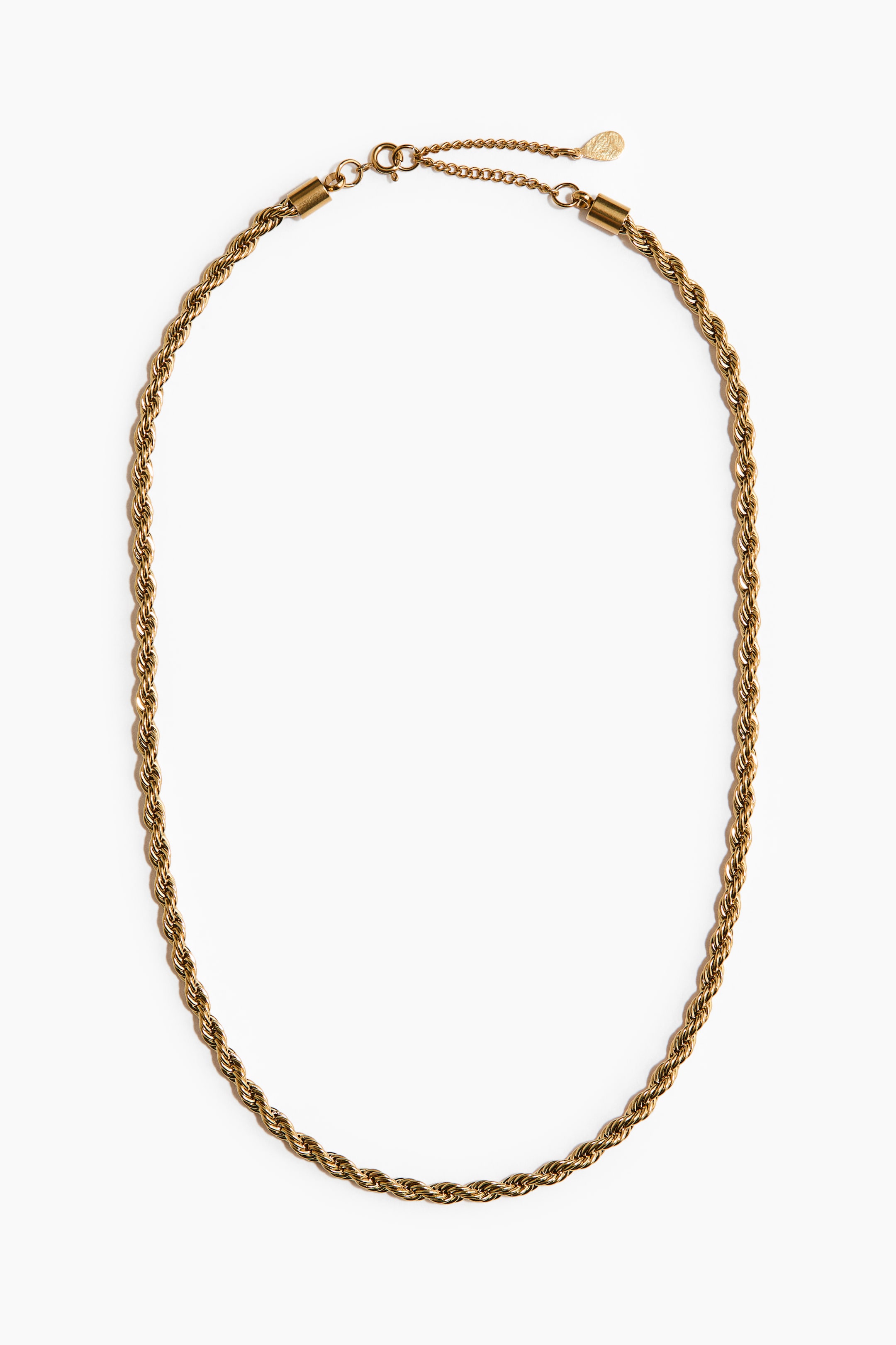 View larger image: A gold-toned rope chain necklace is laid flat, forming an oval shape. It features a lobster clasp fastening and an extender chain with a small tag.