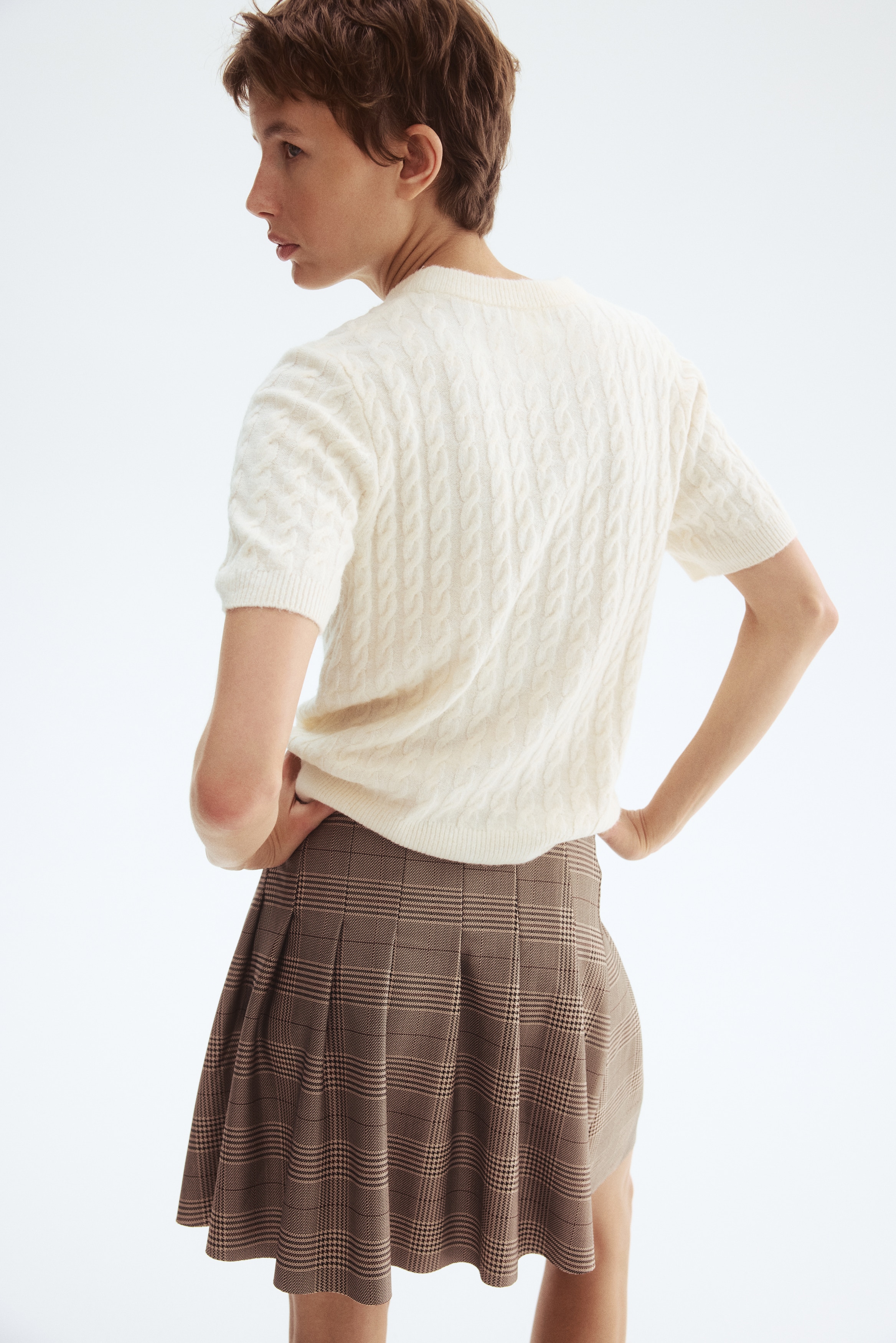 Cable-knit jumper