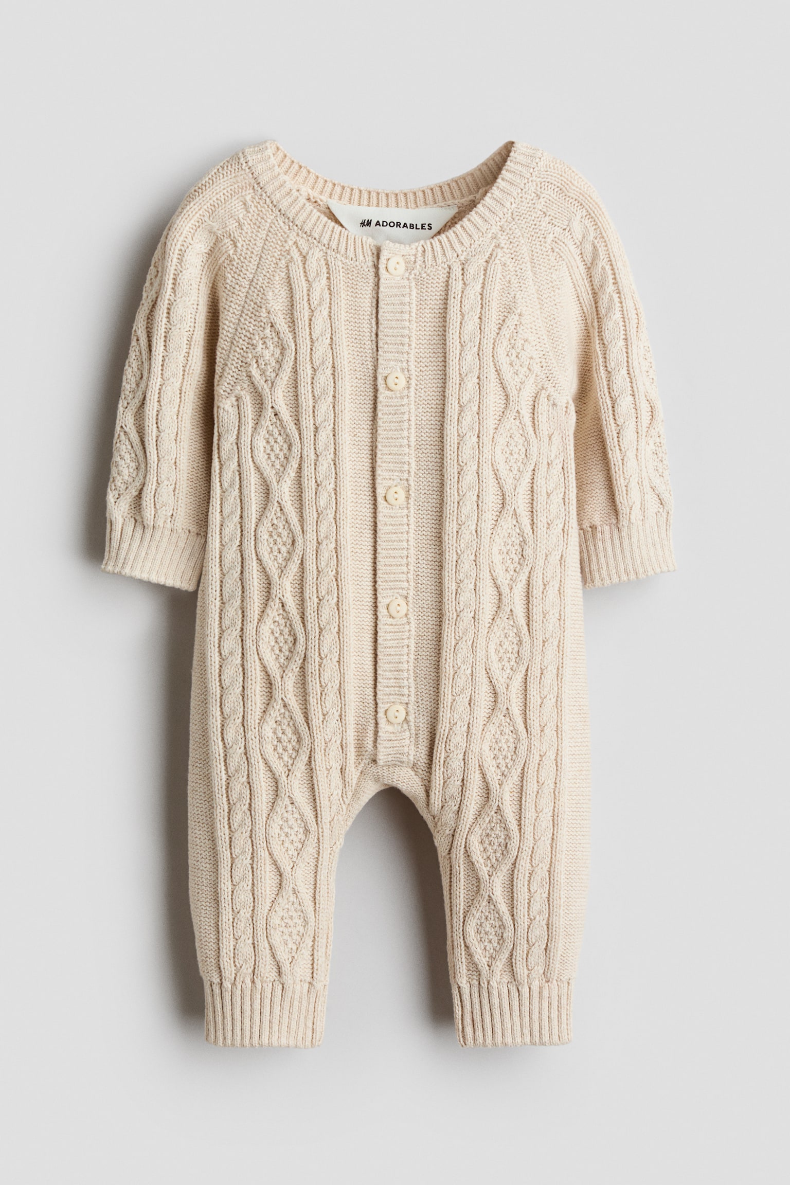 Strukturstickad romper i bomull - Ljusbeige