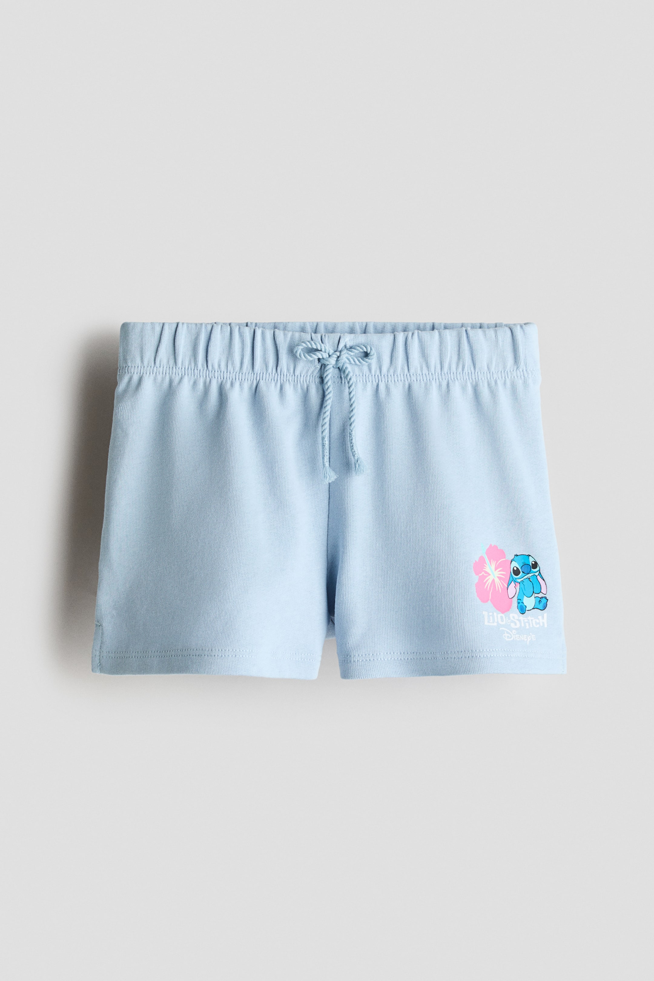 Ver imagen más grande: Pantalón corto de algodón con motivo estampado - Azul claro/Lilo y Stitch - NIÑOS | H&M ES 1