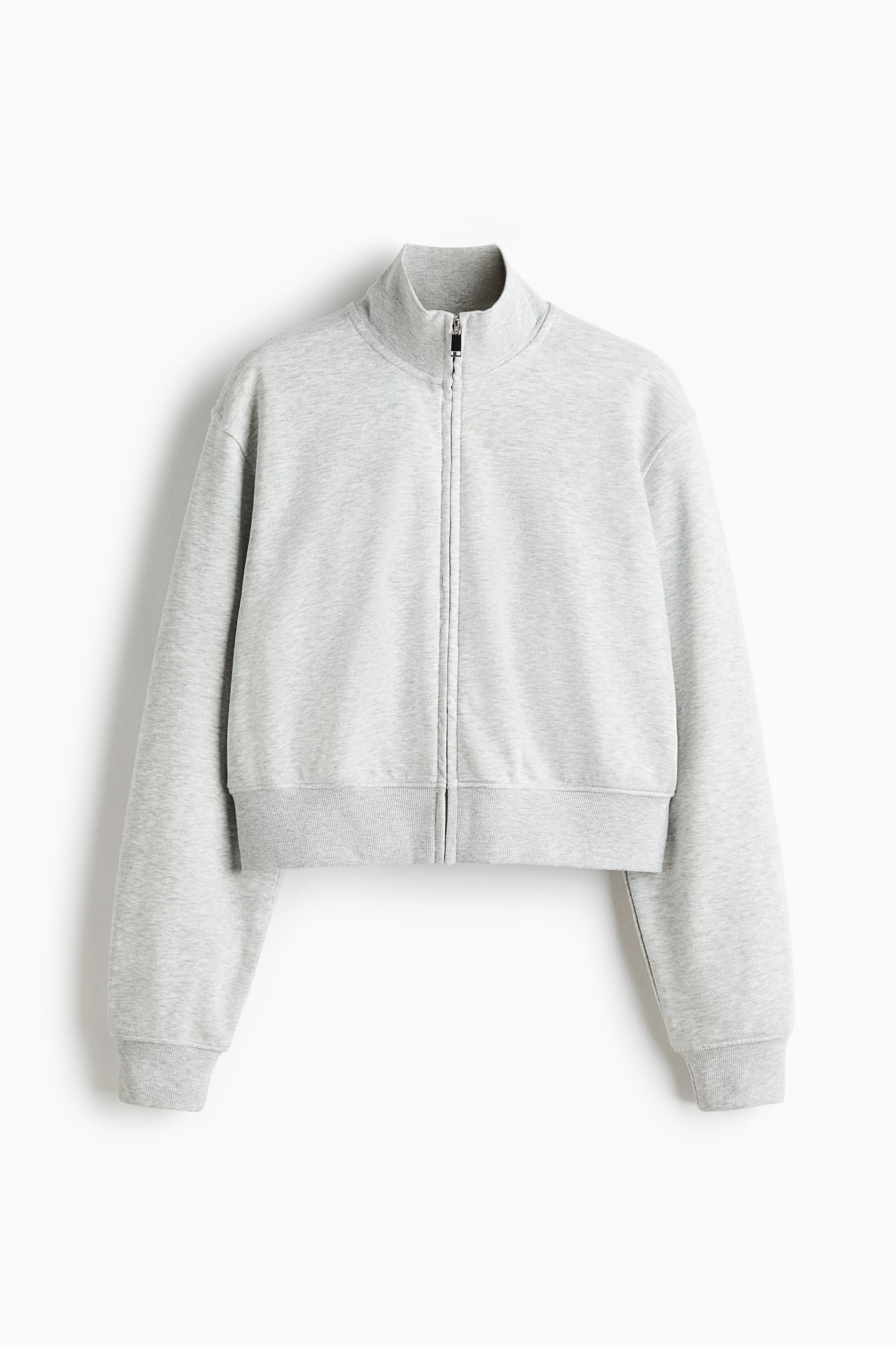 View larger image: A light grey cropped zip-up sweatshirt is presenting as FRONT, featuring a stand-up collar, a full-zip front closure with a metallic pull, and ribbed cuffs and hem.