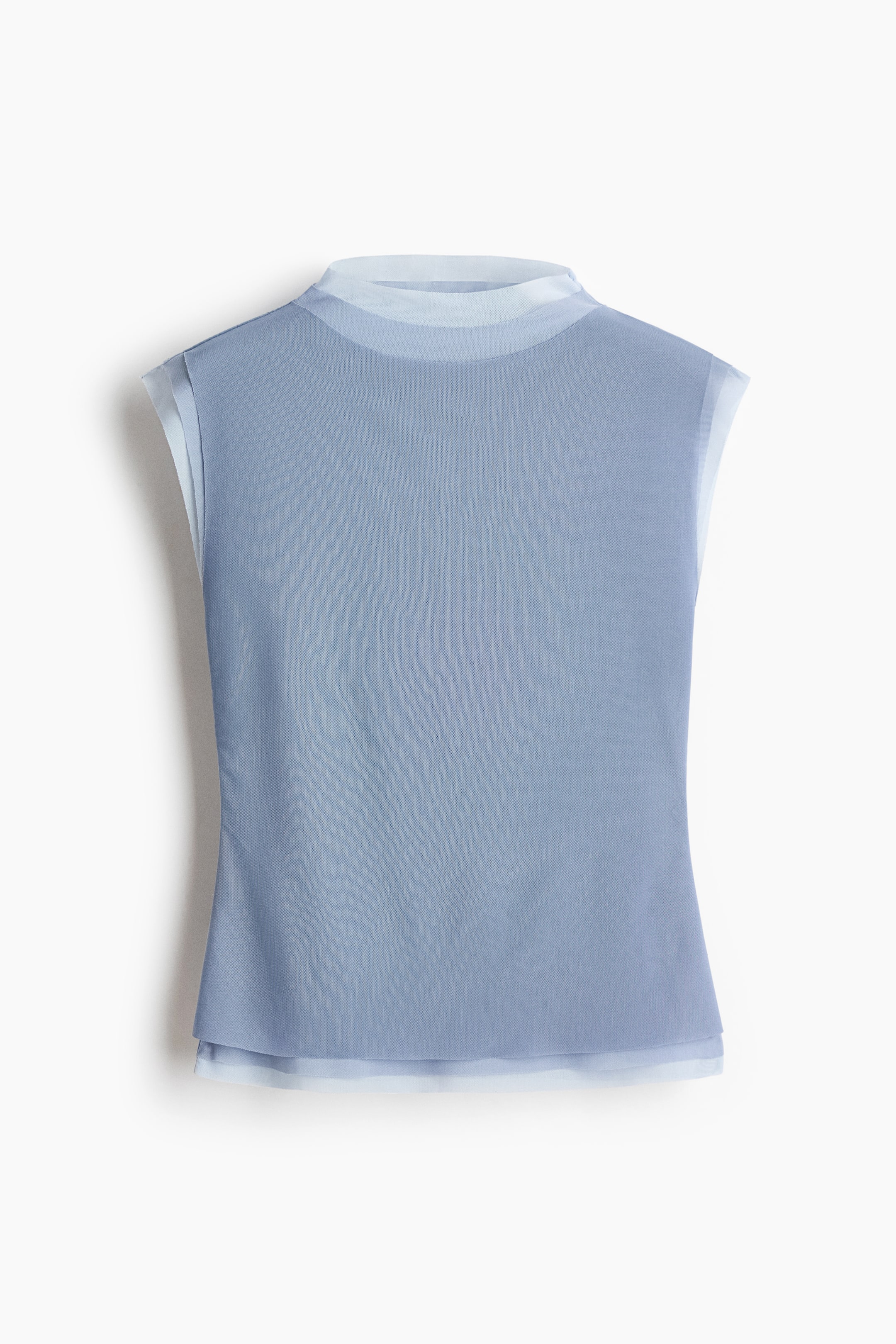 View larger image: This light blue sleeveless top is facing front, showcasing a layered design with a sheer, lighter blue underlay peeking out at the high collar, armholes, and straight hem. The solid, dusty-blue outer layer presents a smooth texture and a clean, straight fit.