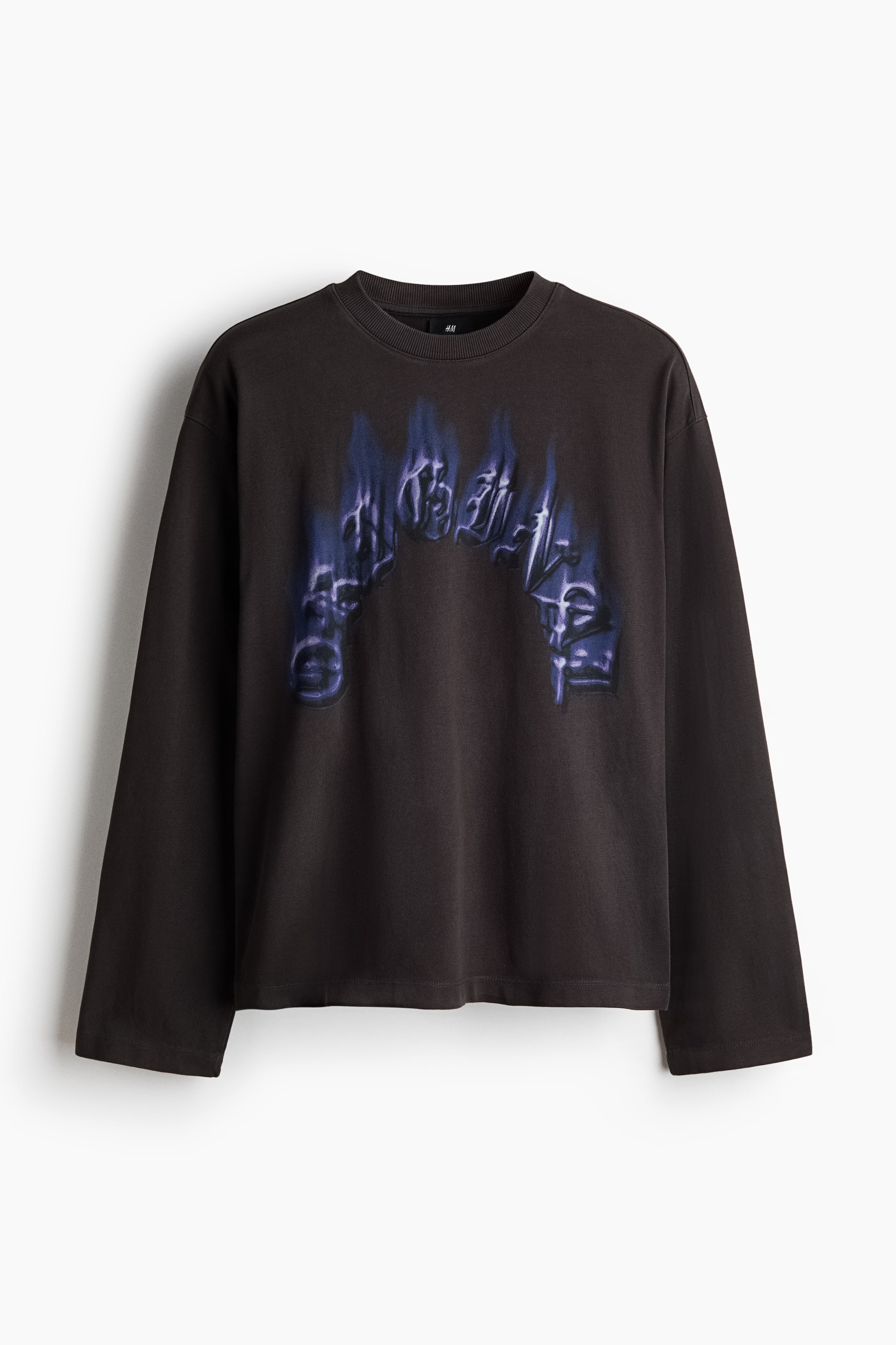 View larger image: A dark grey long-sleeved T-shirt features a large blue and purple flame-like graphic across the front. It has a ribbed crew neck and long, loose-fitting sleeves.