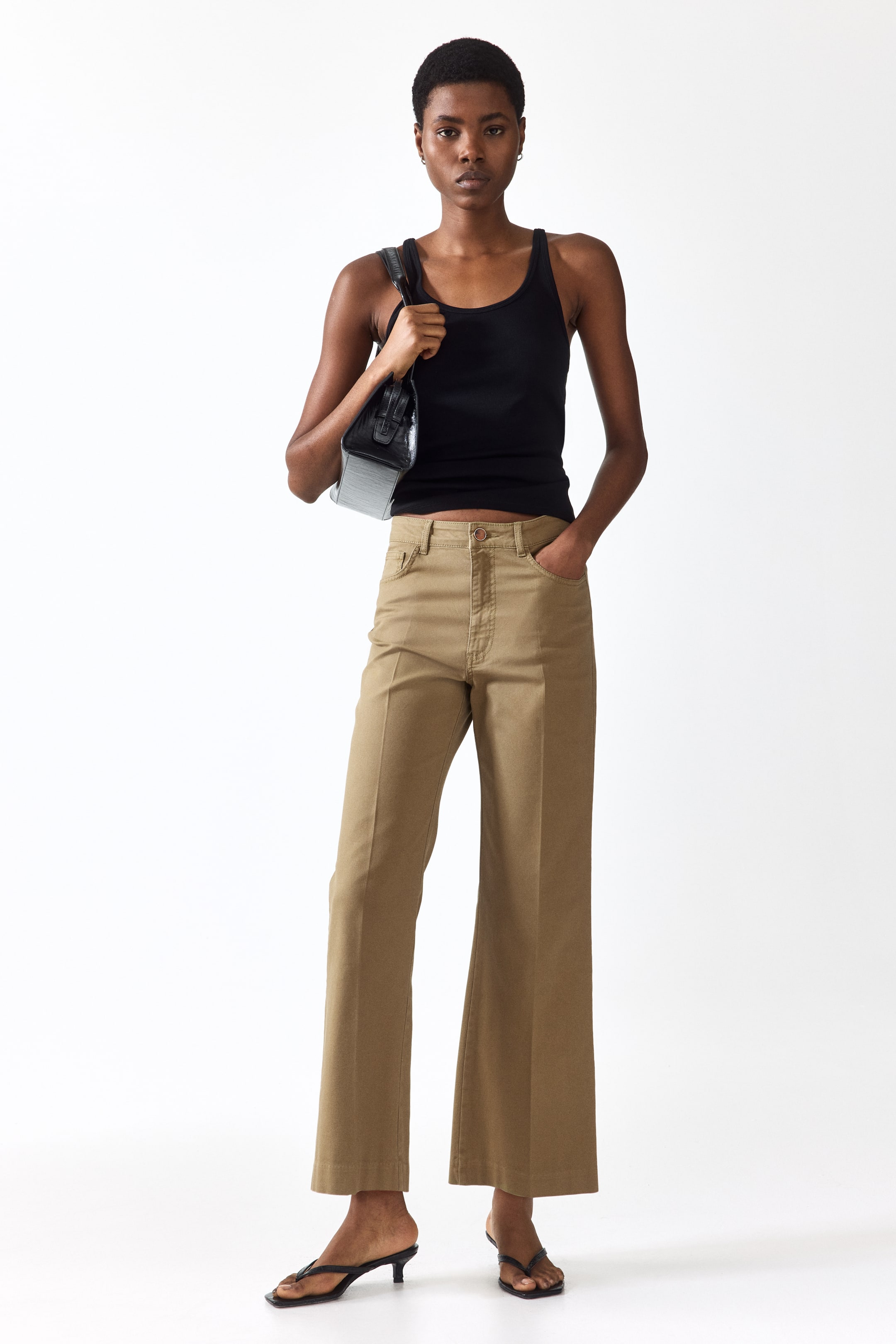 Visualizza immagine più grande: Pantaloni bootcut in tela di cotone - Verde kaki - DONNA | H&M IT 1