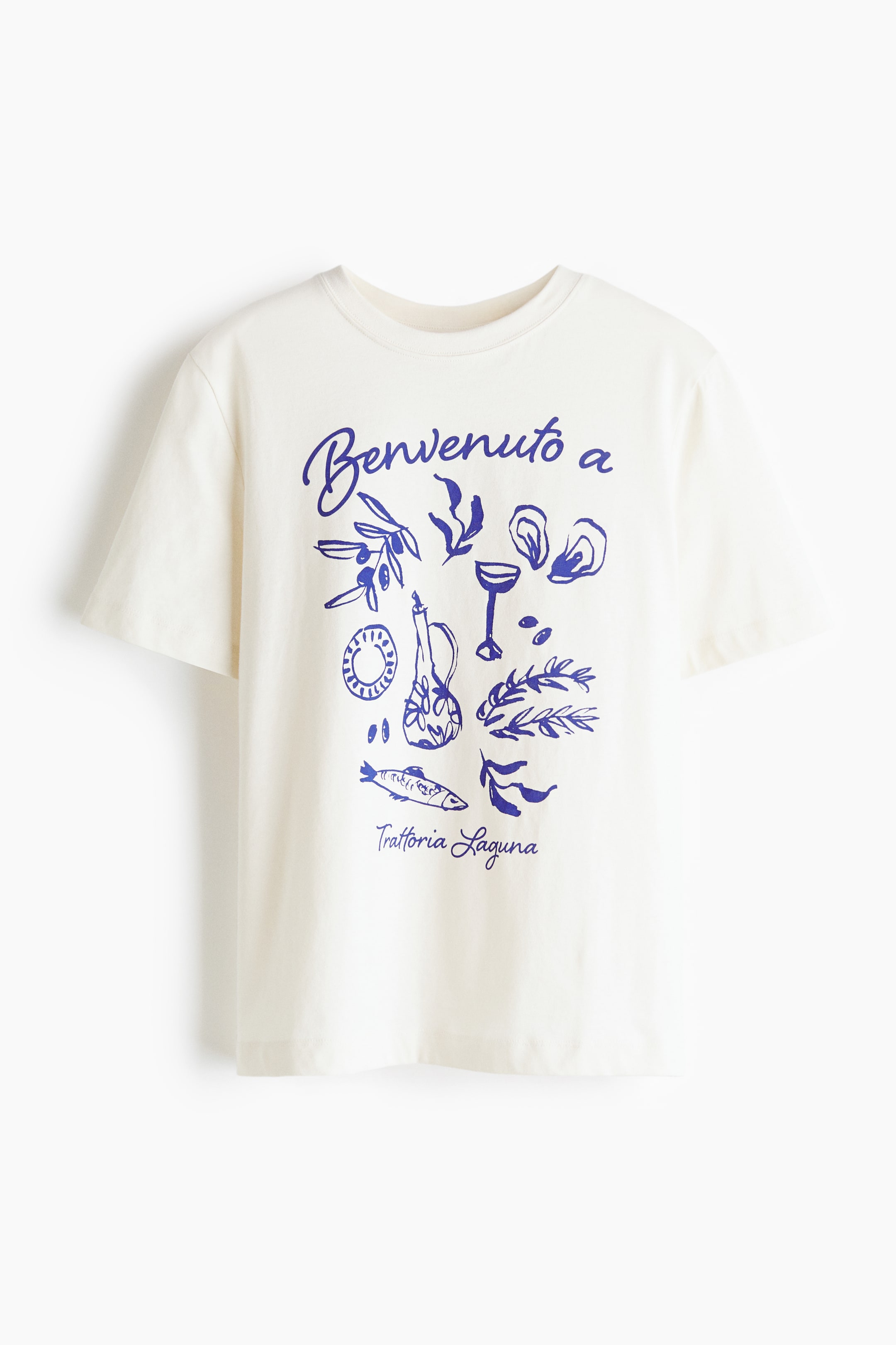 View larger image: A classic cotton jersey t-shirt is presented from the front, featuring a round neckline, short sleeves, and a straight-cut hem in an off-white colour. It showcases a central blue print with the text "Benvenuto a Trattoria Laguna" surrounded by illustrations of olive branches, oysters, a fish, and a carafe.
