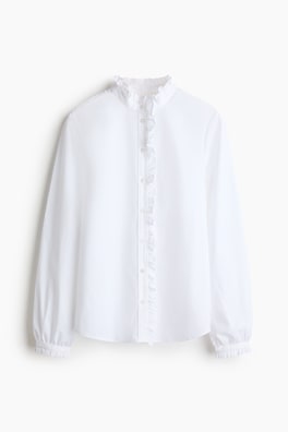 Blus med volangkanter och knäppning fram