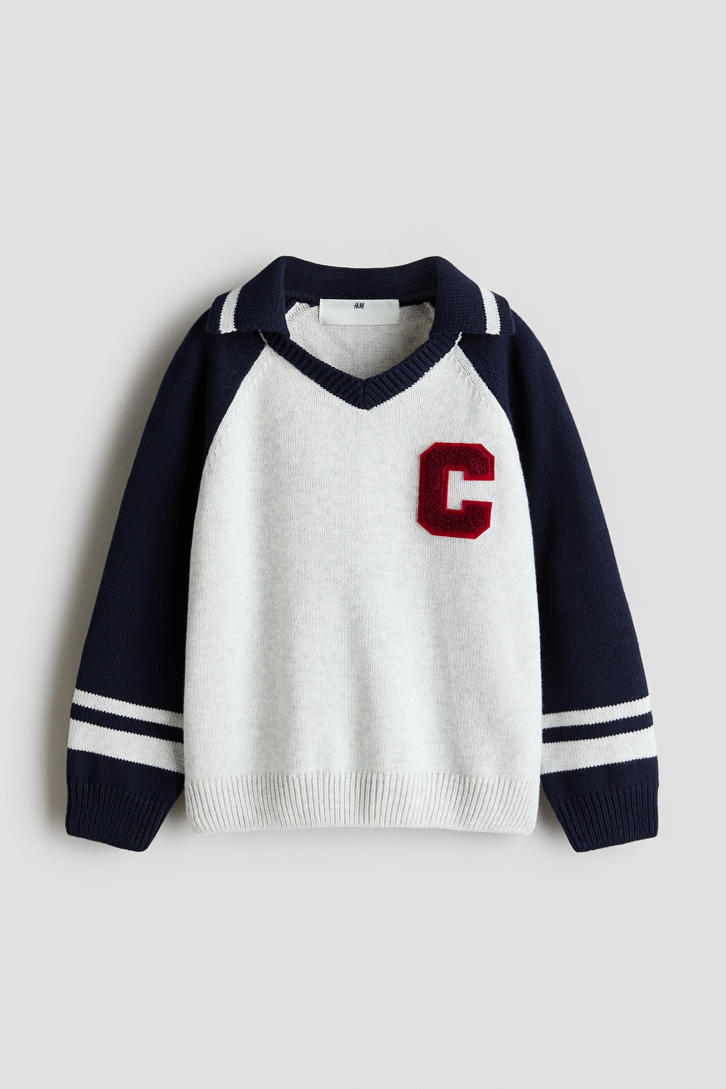 Appliqué-motif polo jumperModel