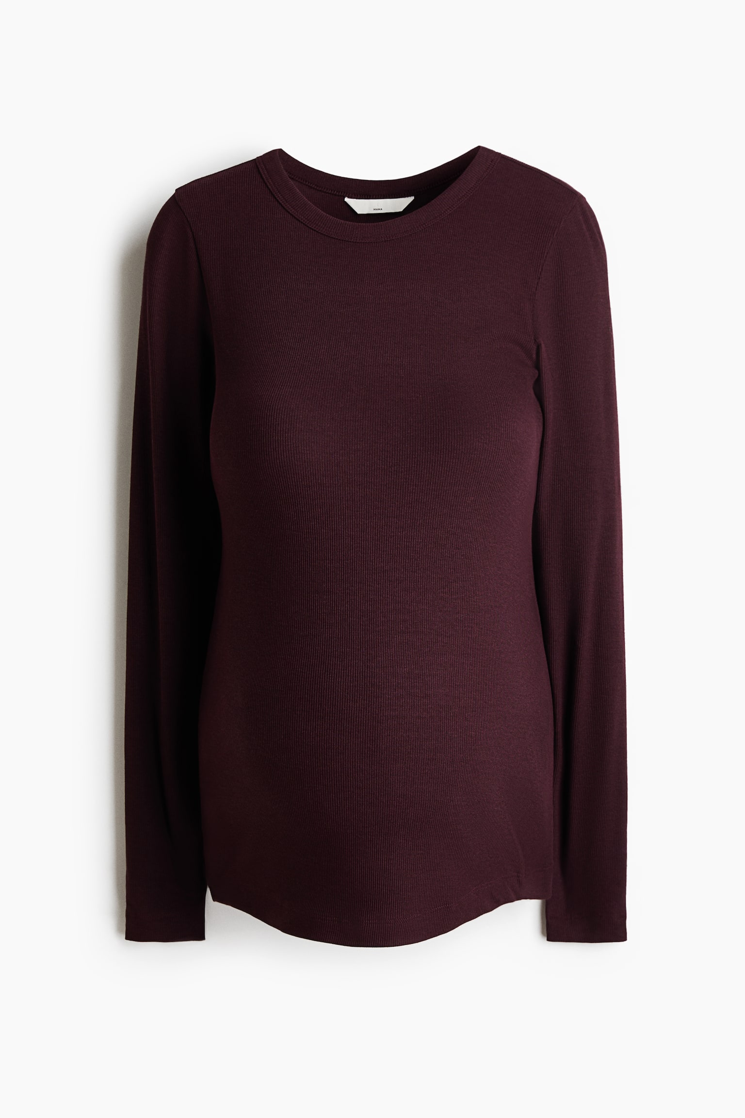 A dark burgundy fitted top in ribbed jersey is shown front-facing, featuring a classic round neckline and long sleeves. The top has a fine vertical ribbed texture throughout and a subtly curved hemline.