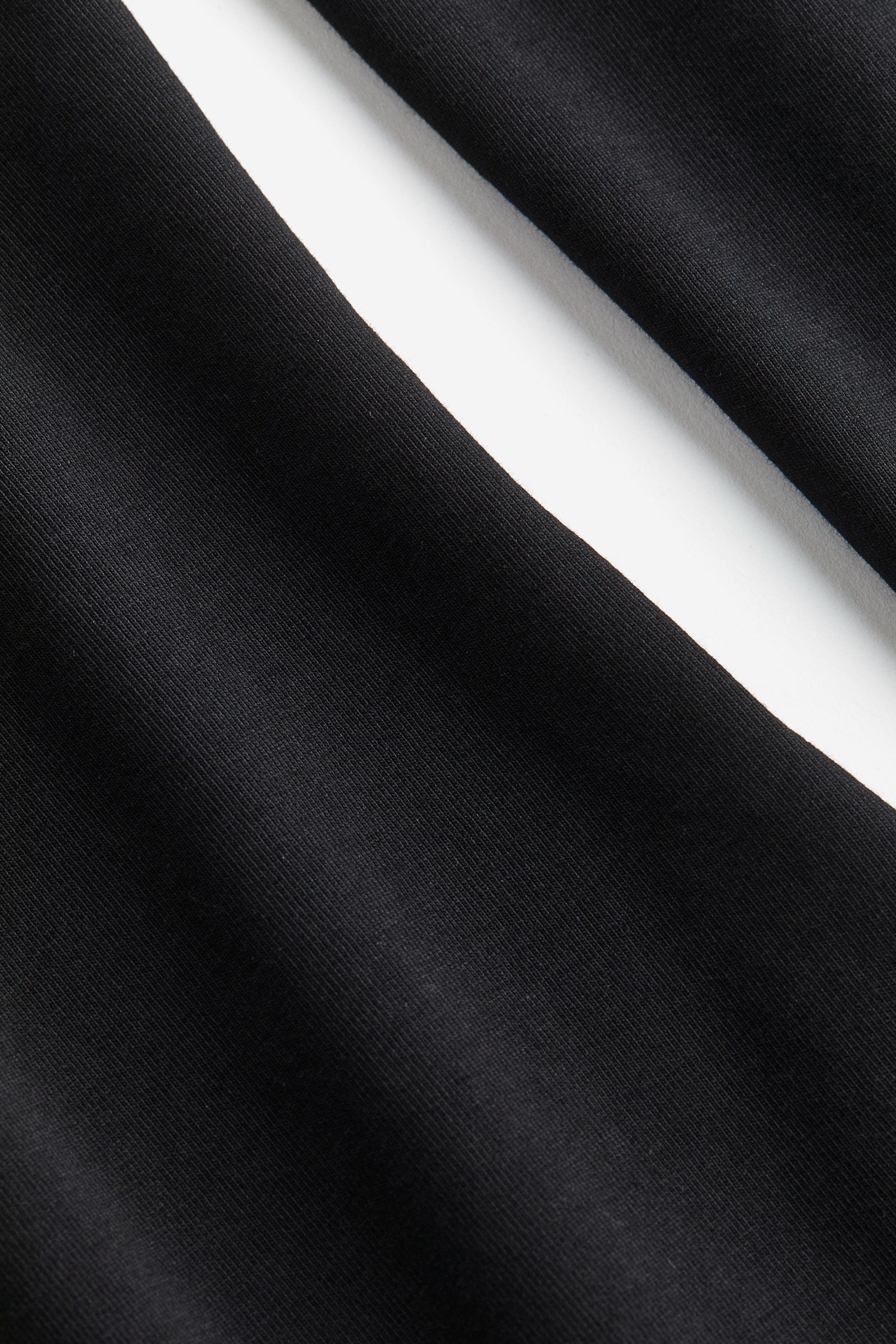 Visualizza immagine più grande: Maglia in jersey aderente - Nero - DONNA | H&M IT 2