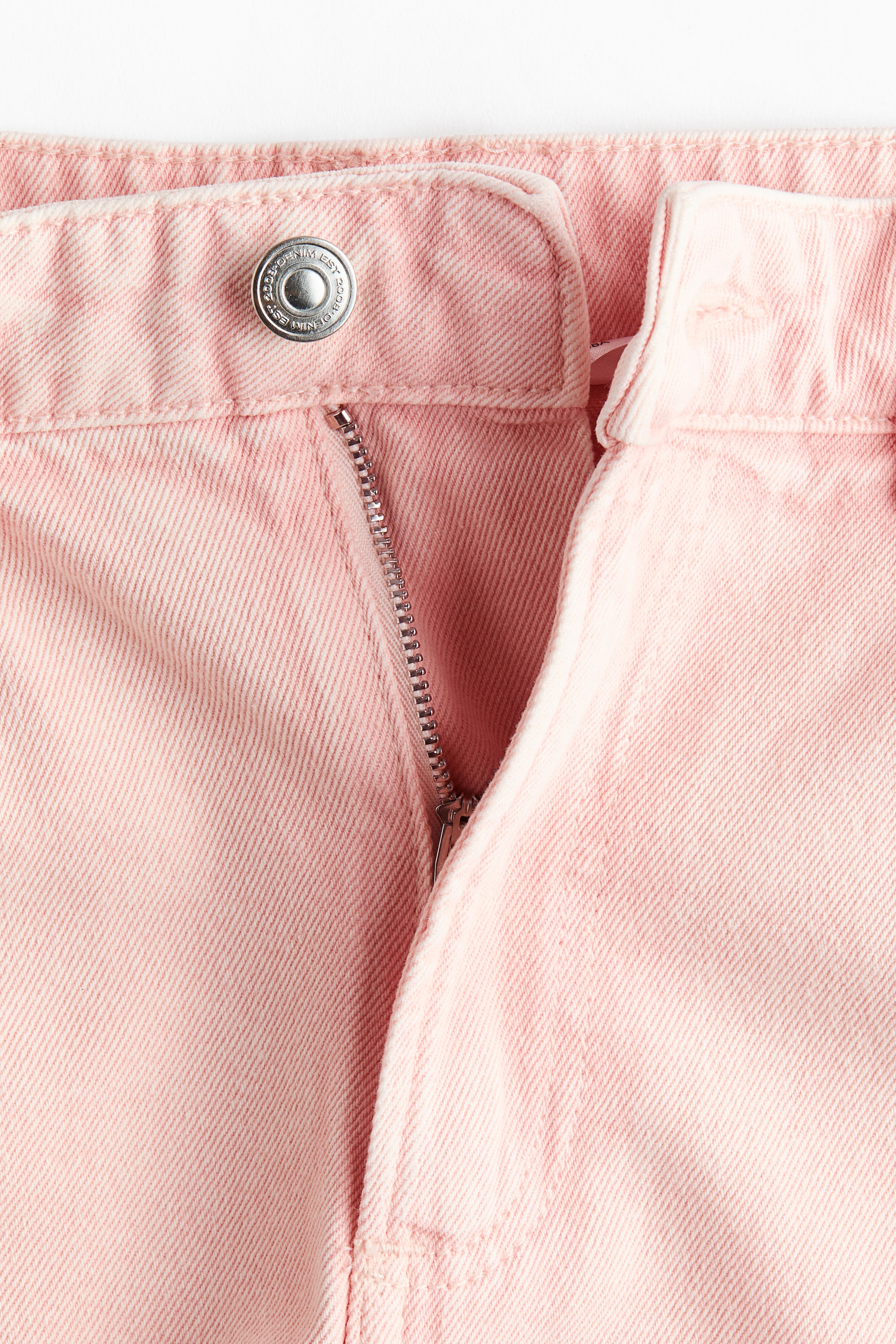 Raw-edge denim shorts