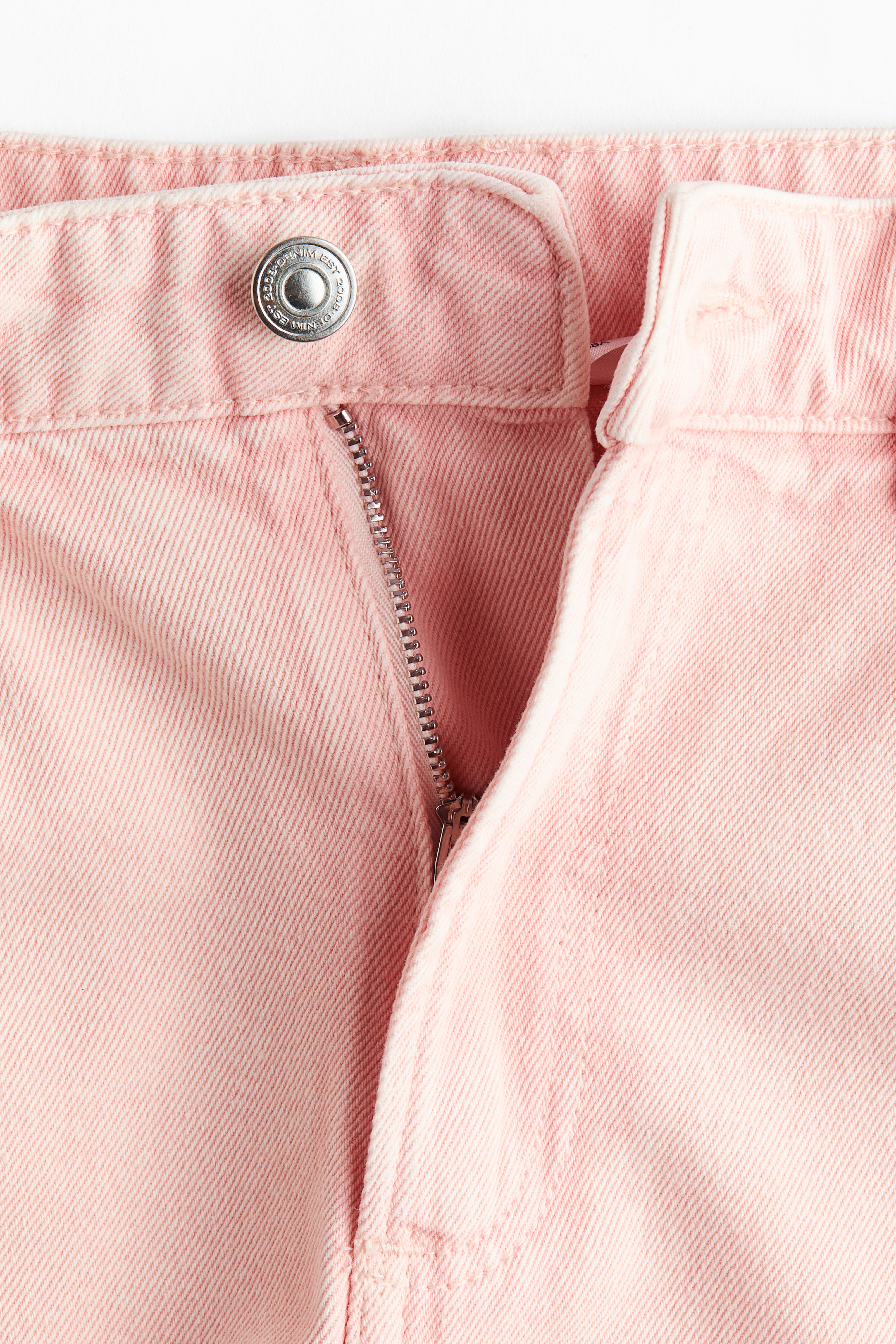 Raw-edge denim shorts