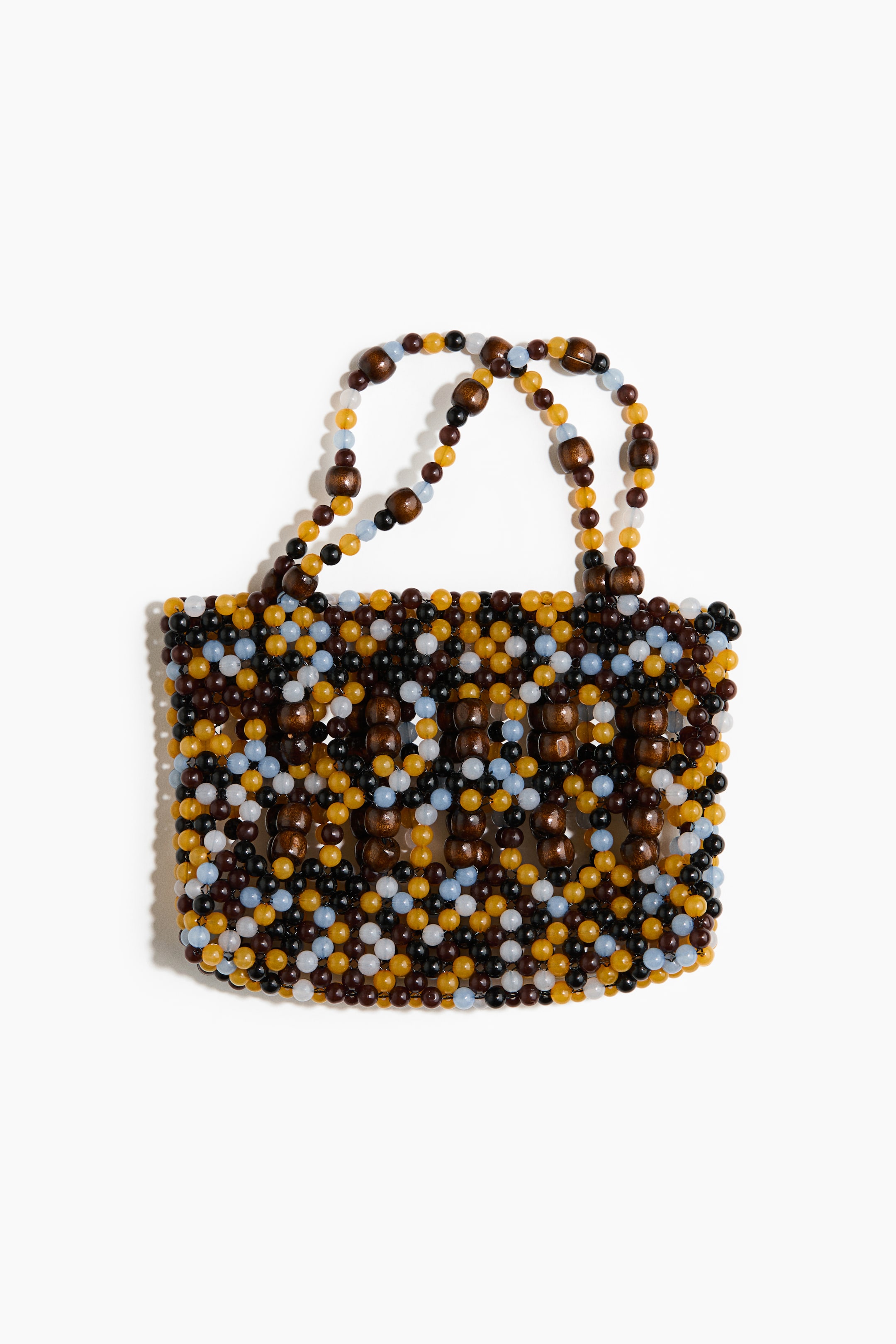 View larger image: The beaded bag is showcased upfront, with its body and dual top handles crafted from strung beads. It highlights small, round beads in black, light blue, cream, and mustard yellow, interspersed with larger, barrel-shaped dark brown wooden beads.