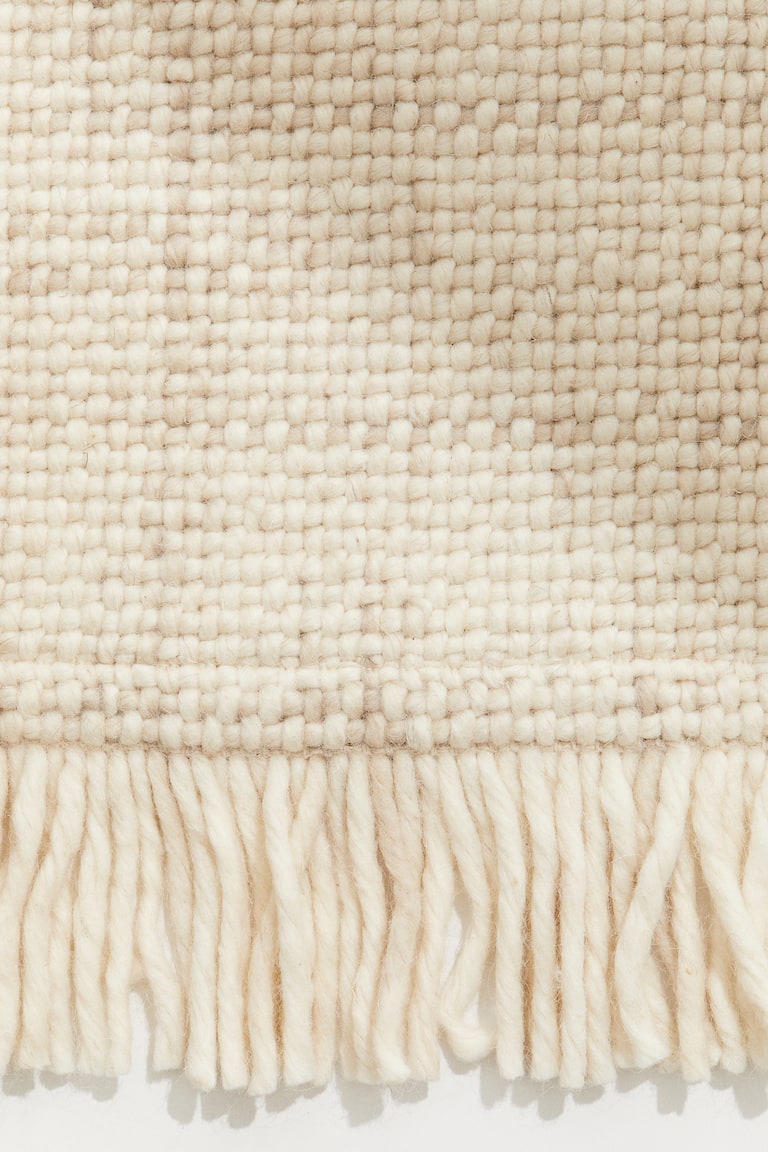 Light beige Fringed wool-blend rug at H&M Home | H&M GB