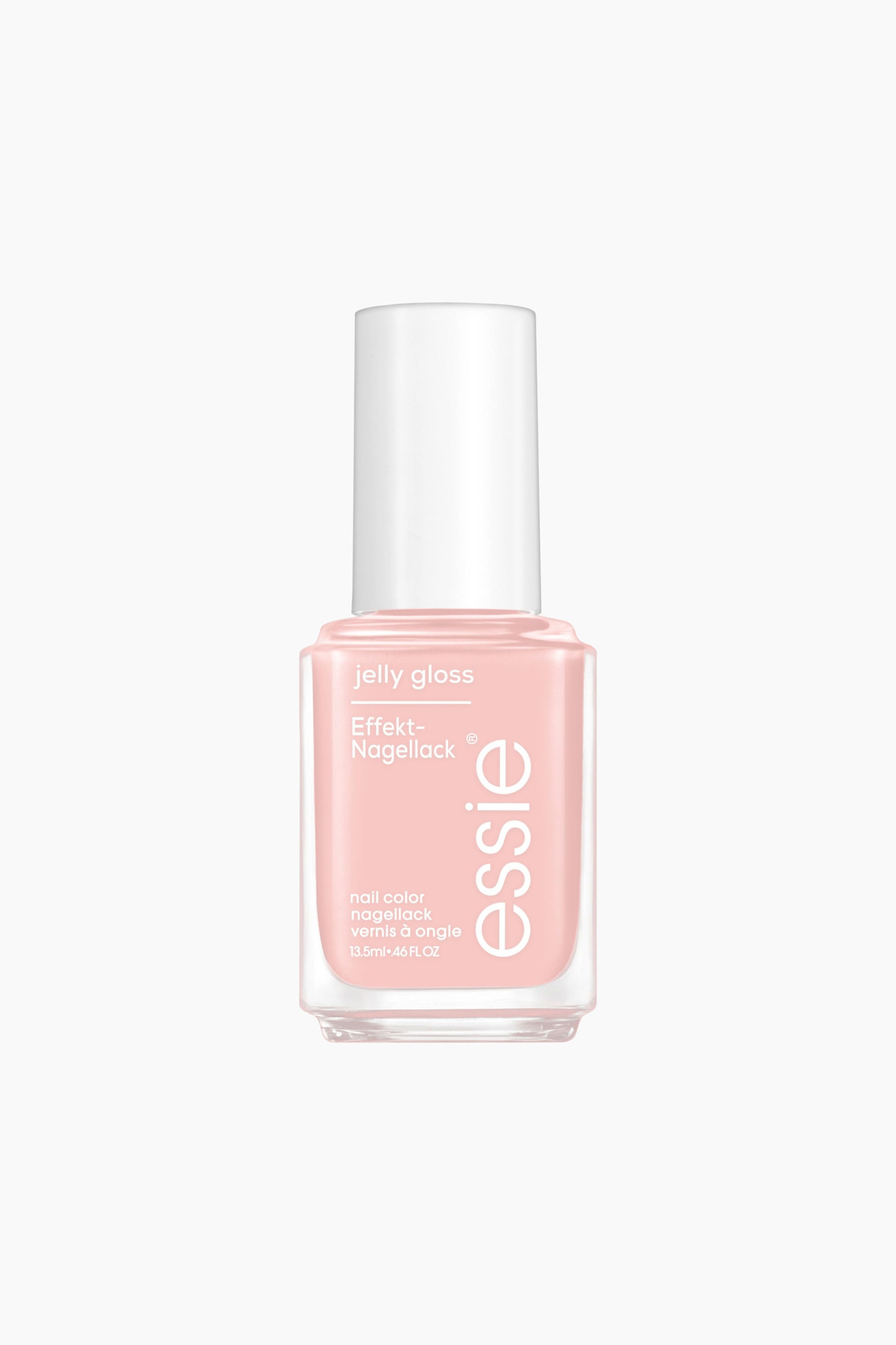 Größeres Bild ansehen: Eine Essie-Nagellackflasche steht nach vorne gerichtet, mit einer klaren rechteckigen Glasflasche, die mit hellrosa Lack gefüllt ist. Sie ist mit einem weißen zylindrischen Verschluss versehen und zeigt auf der Vorderseite die Aufschriften "jelly gloss" und "essie".