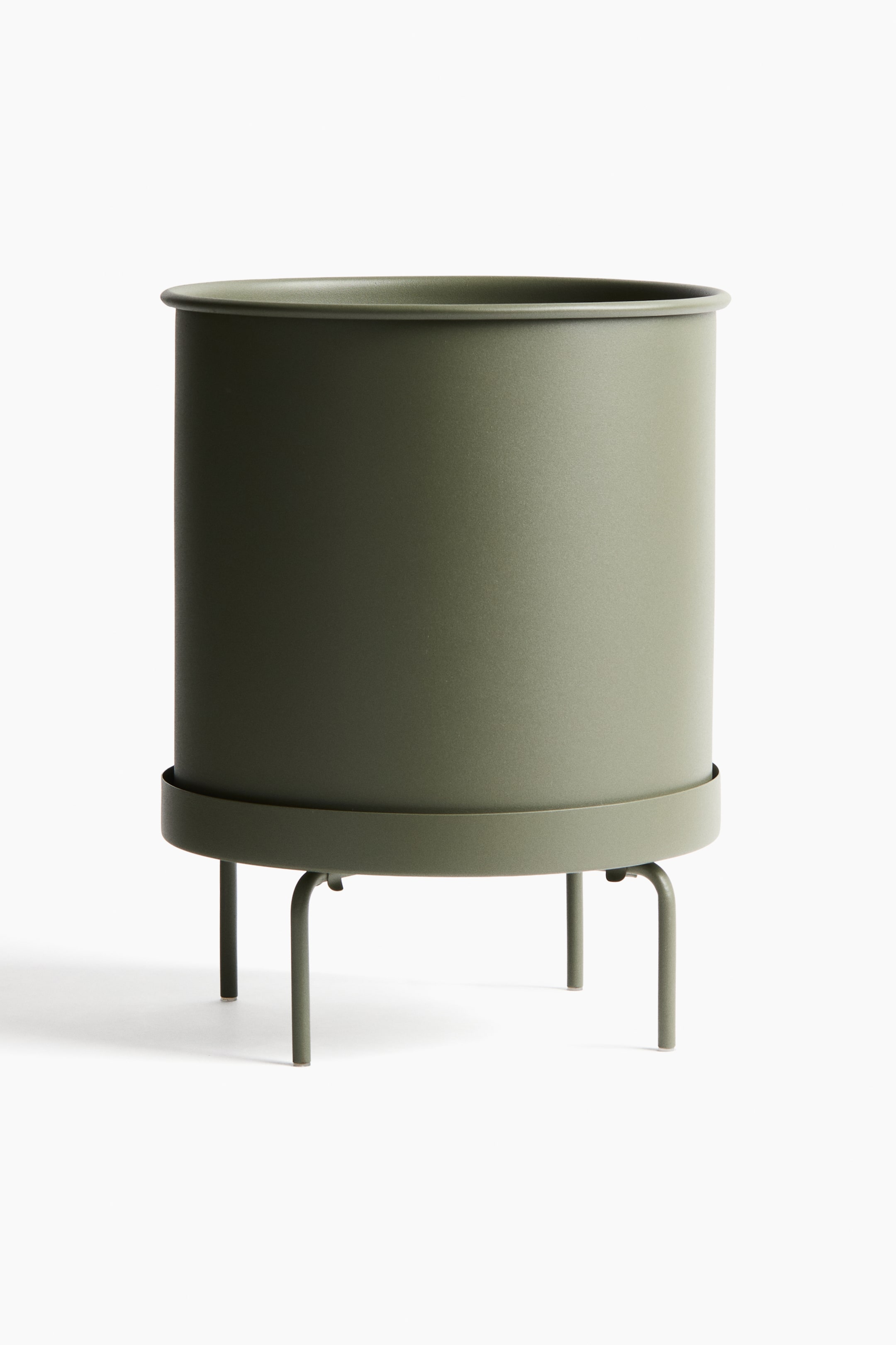 View larger image: An extra-large, cylindrical metal plant pot with a matte olive green finish sits on a matching metal stand. The pot features a rolled rim and a drainage hole at the bottom, while the stand includes a circular saucer with four legs.