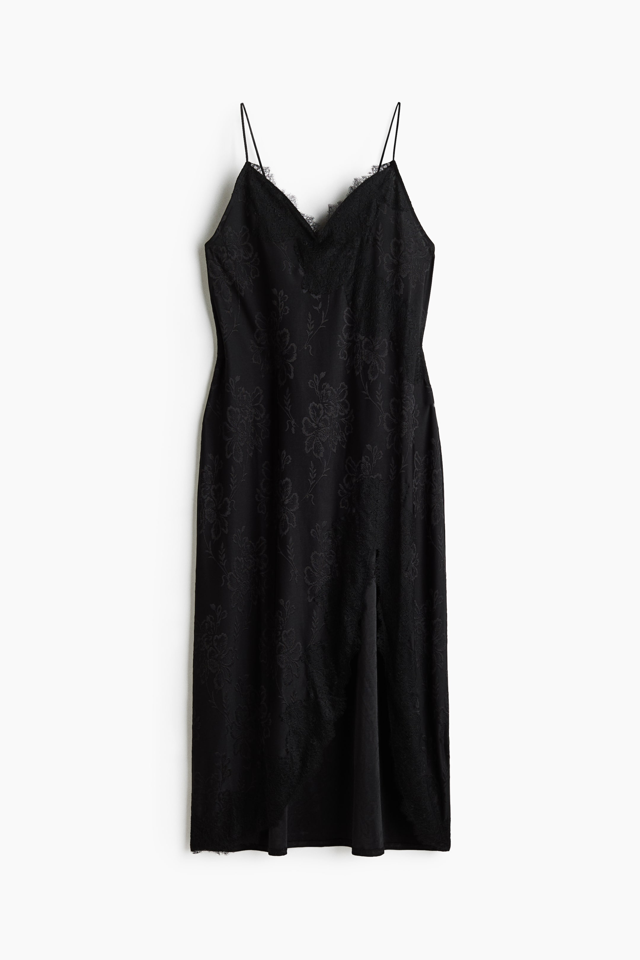 Agrandir l'image: Une robe nuisette noire est suspendue de face, avec de fines bretelles spaghetti, un col en V souligné d'une délicate bordure en dentelle, et un motif jacquard floral sur l'ensemble. Cette robe mi-longue présente une fente haute sur le devant, rehaussée d'une bordure en dentelle assortie le long de l'ourlet.