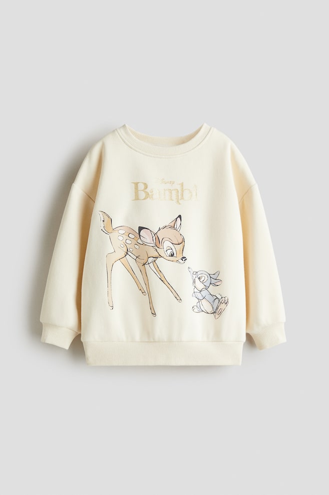 Printed sweatshirt - Light beige/Bambi/Light grey marl/Lilo & Stitch/Light blue/Cinnamoroll/Purple/Lilo & Stitch/Pink/Lilo & Stitch/White/Hello Kitty/Light blue/Lilo & Stitch/Light beige/Lilo & Stitch/Pink/Peppa Pig/Pink/Hello Kitty/Turquoise/Gabby's Dollhouse/Light purple/Pink - 1