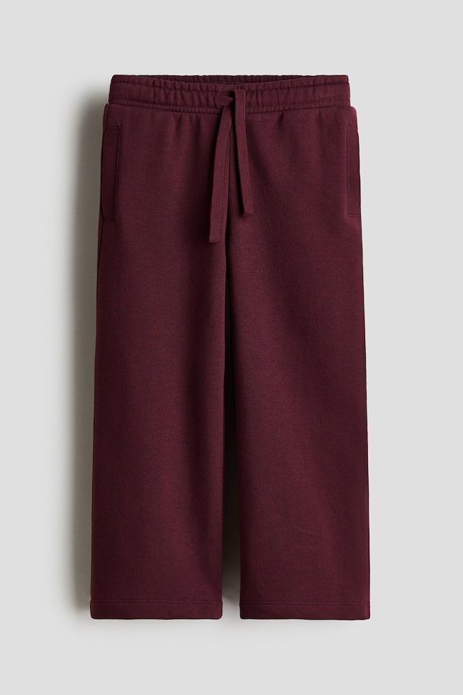 Široké kalhoty jogger s česaným rubem - Tmavě červená/Růžová/Světle fialová/Světle růžová/Černá/Světle béžový melír/Světle béžová/leopardí potisk/Světle růžová - 1