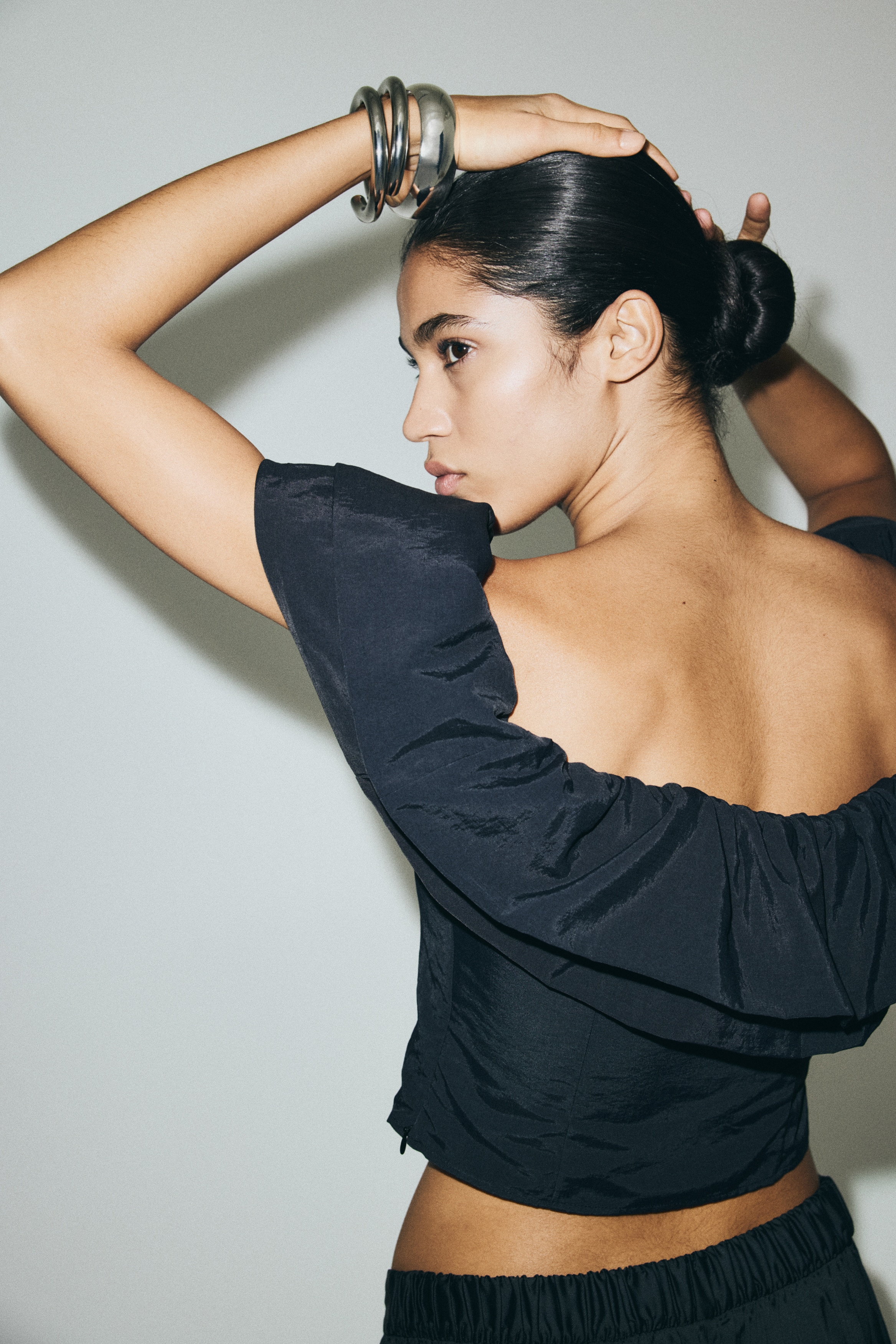 Frill-trimmed off-the-shoulder top