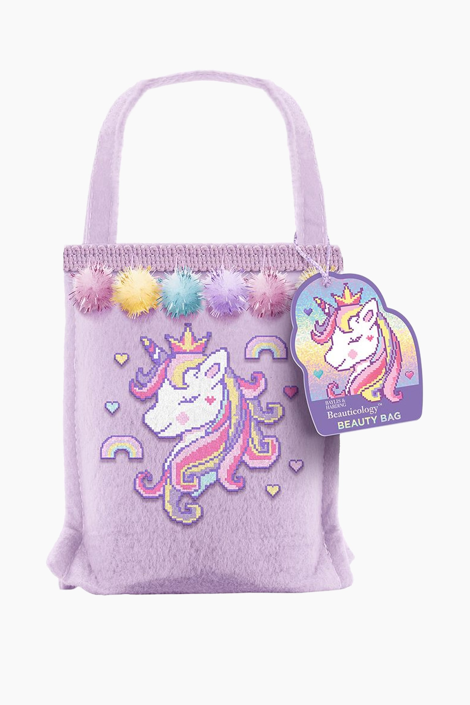 Unicorn Beauty Bag Gift Set vises forfra og har en lyse lilla filt-kropp med ett enkelt topphÃ¥ndtak og en heklet Ã¸vre kant dekorert med fem fargerike tinsel-pomponger. Forsiden av bagen viser en pikselert grafikk av en kronet enhjÃ¸rning med fargerik manke, omgitt av smÃ¥ regnbuer og hjerter, mens en matchende lilla merkeetikett henger pÃ¥ hÃ¸yre side.