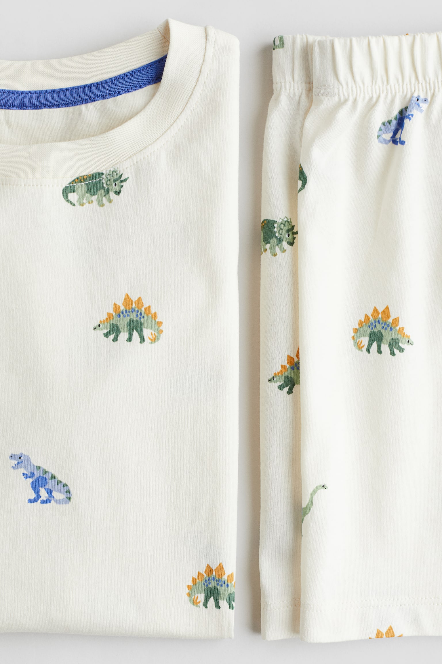 Printed cotton pyjamas - Natural white/Dinosaurs/Dark blue/Patterned/Black/Footballs/Light grey marl/Footballs/Light blue/Dinosaur - 2