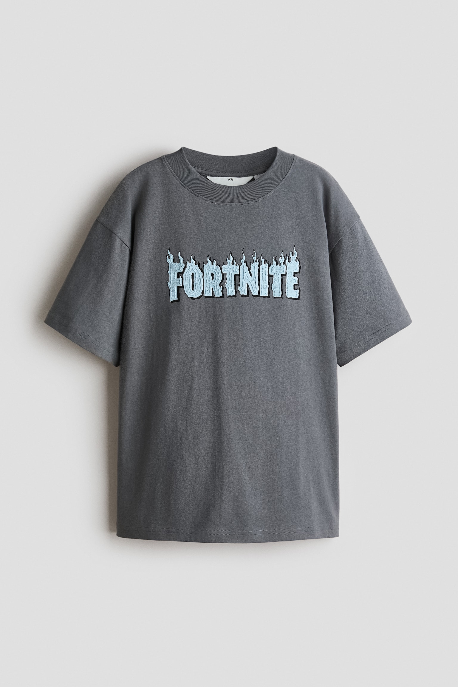 T-shirt con stampa - Grigio mélange/Fortnite/Grigio chiaro/Brawl Stars/Grigio/SpongeBob SquarePants/Beige/Garfield/Grigio/Fortnite/Nero/Garfield/Verde menta chiaro/I Simpson/Blu polvere chiaro/SpongeBob/Crema/Minecraft/Bianco/SmileyWorld®/Bianco/I Simpson/Azzurro/Minecraft/Grigio scuro/SmileyWorld®