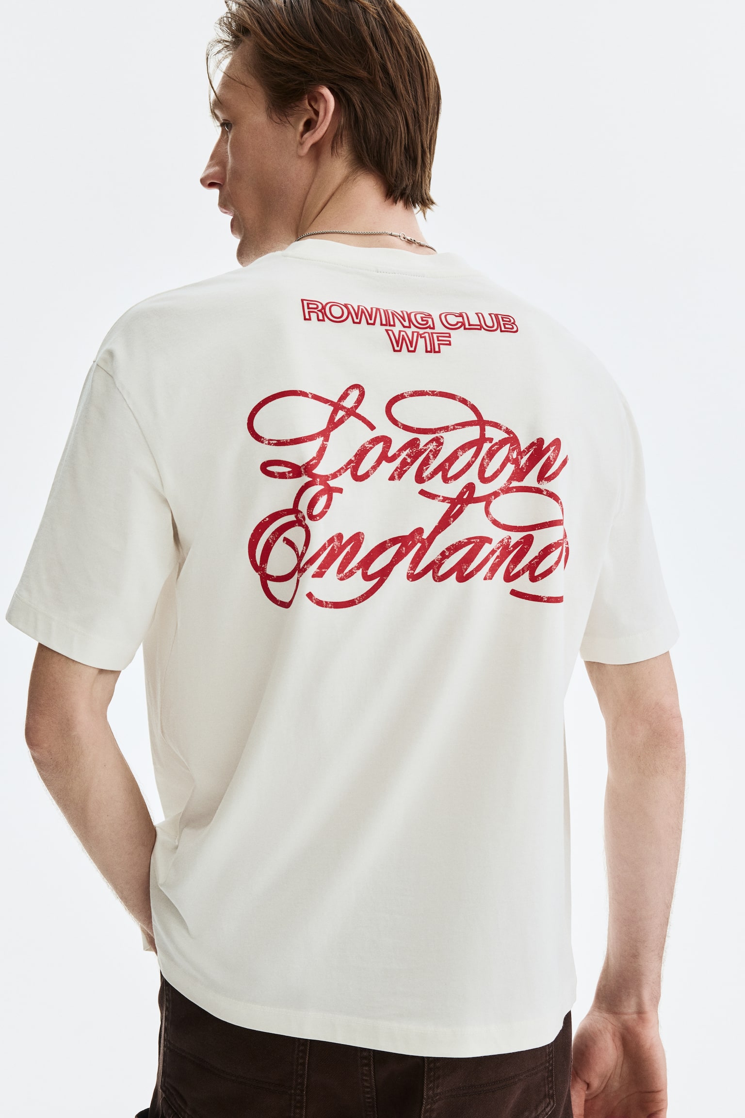 טישירט עם הדפס Loose Fit - לבן/London/בז'/Run Wild/שחור/Golden Sunset/אפור כהה/Sports Archives 08/כחול כהה/New York City/לבן/SoHo NYC/לבן/SoHo/לבן/Soho/ירוק-כחול כהה/Soho NYC/בורדו/Athletics/סגול/NYC/כחול כהה/SoHo NYC - 5