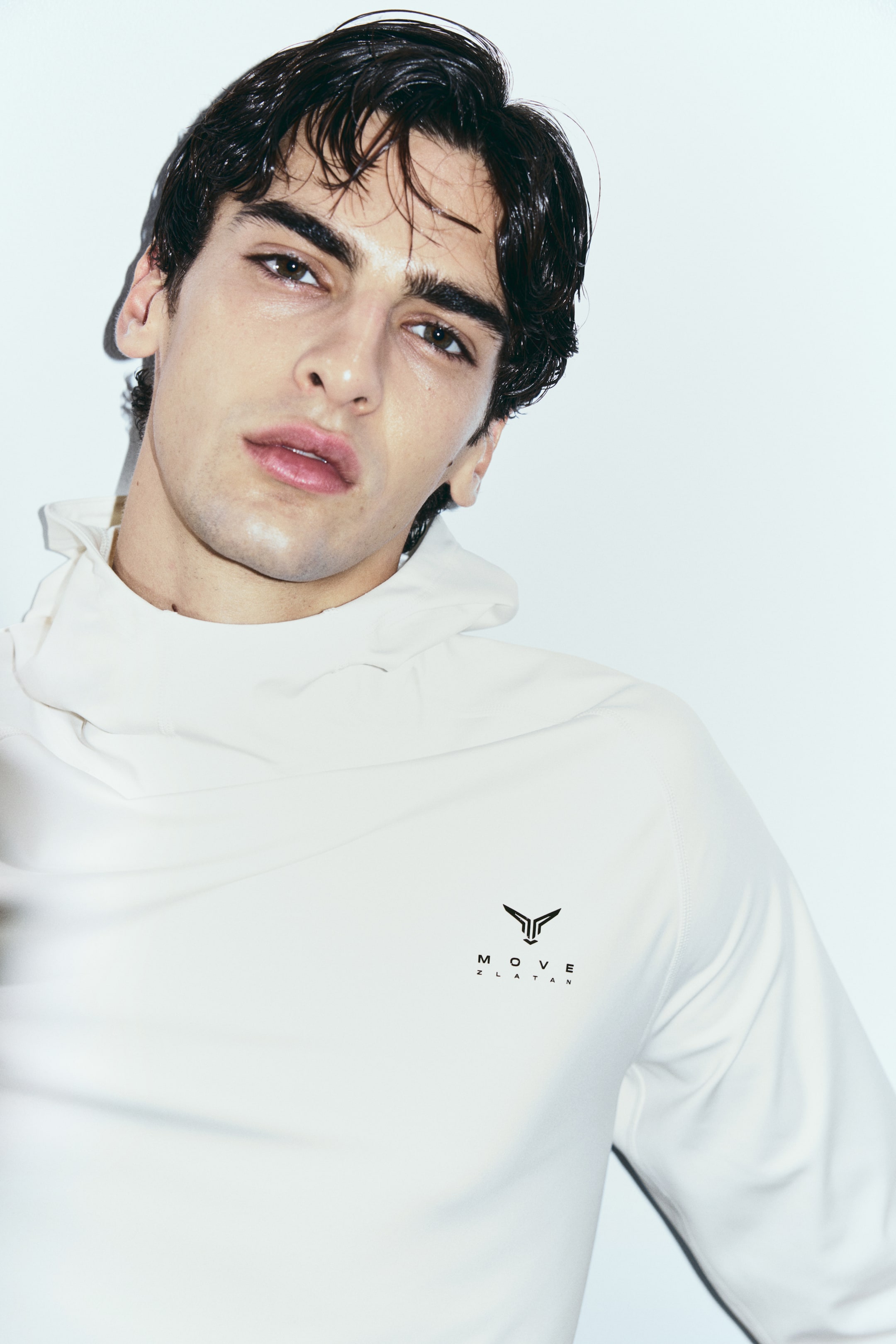 View larger image: Warming sports hoodie with ThermoMove™ - Cream/Move Zlatan - Men | H&M IN 1