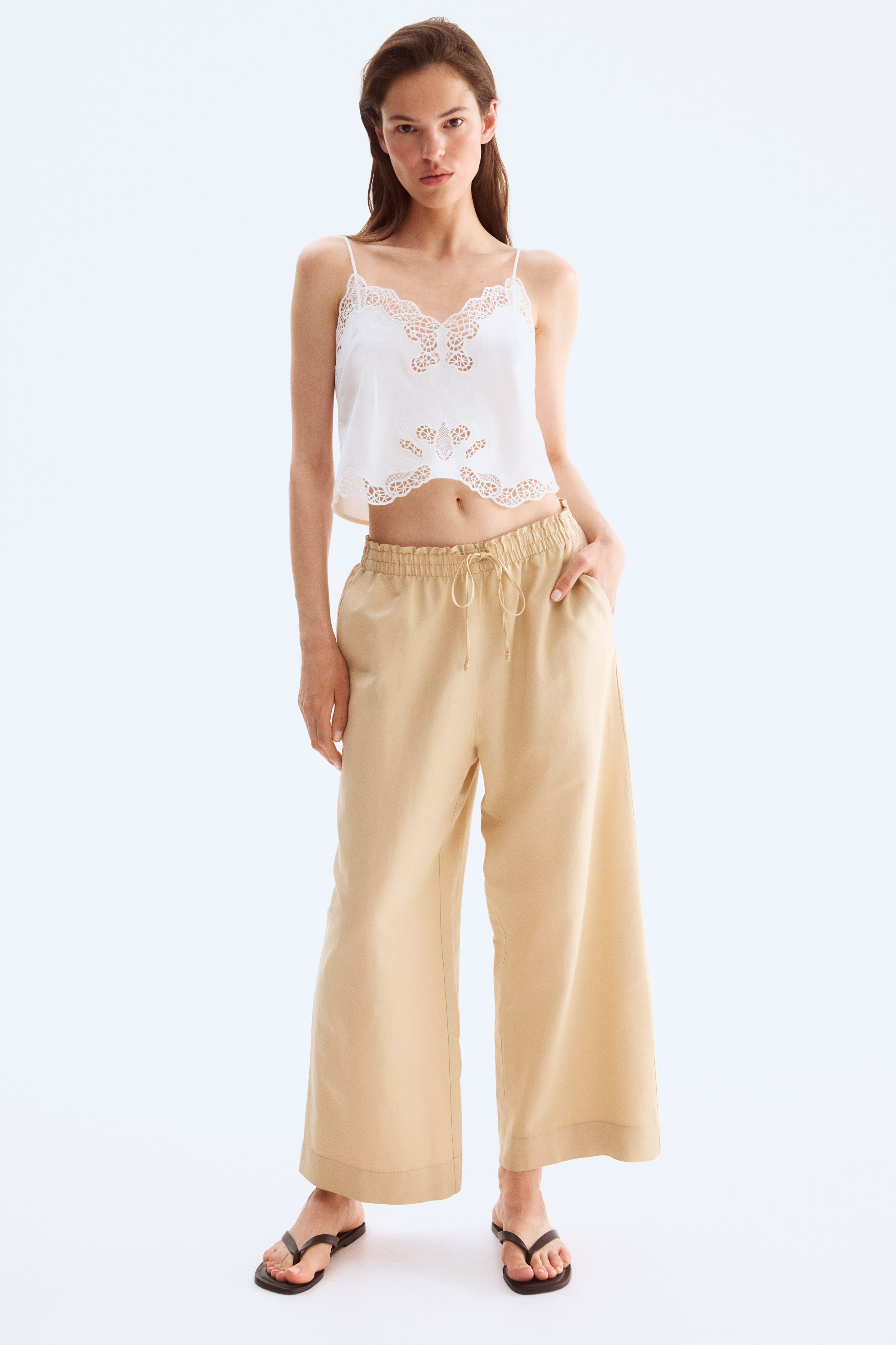Cropped linen-blend trousers