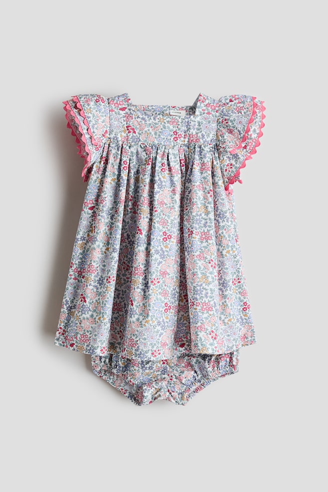 Tweedelige katoenen set - Jurk en pofbroekje - Lichtblauw/bloemen - 1