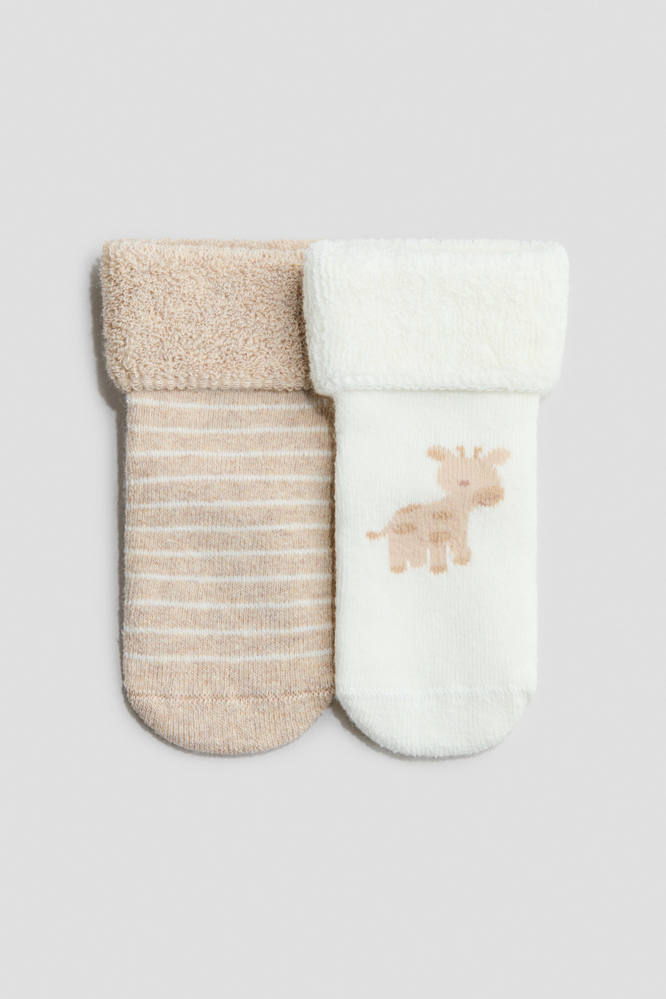 Ingrandisci l'immagine: Calze in spugna, 2 paia - Beige/giraffa - BAMBINO | H&M CH 1