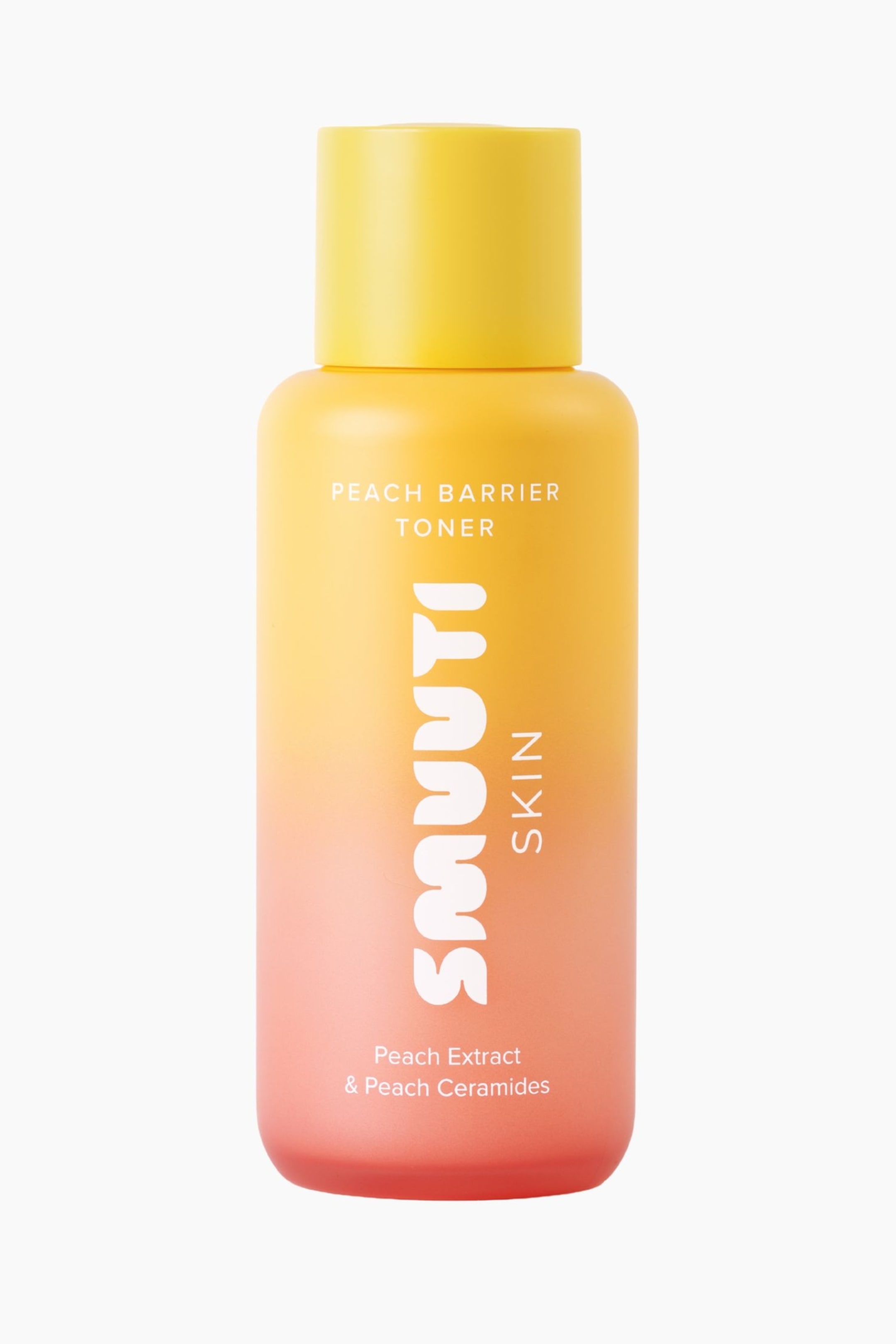 Visa större bild: En cylindrisk flaska Peach Barrier Toner står upprätt och vänd framåt, med en färggradient som övergår från gult upptill till persikorosa nedtill. Flaskan har en solid gul cylindrisk kork och visar vit text som lyder "PEACH BARRIER TONER", "SMUUTI SKIN" vertikalt samt "Peach Extract & Peach Ceramides" nära basen.