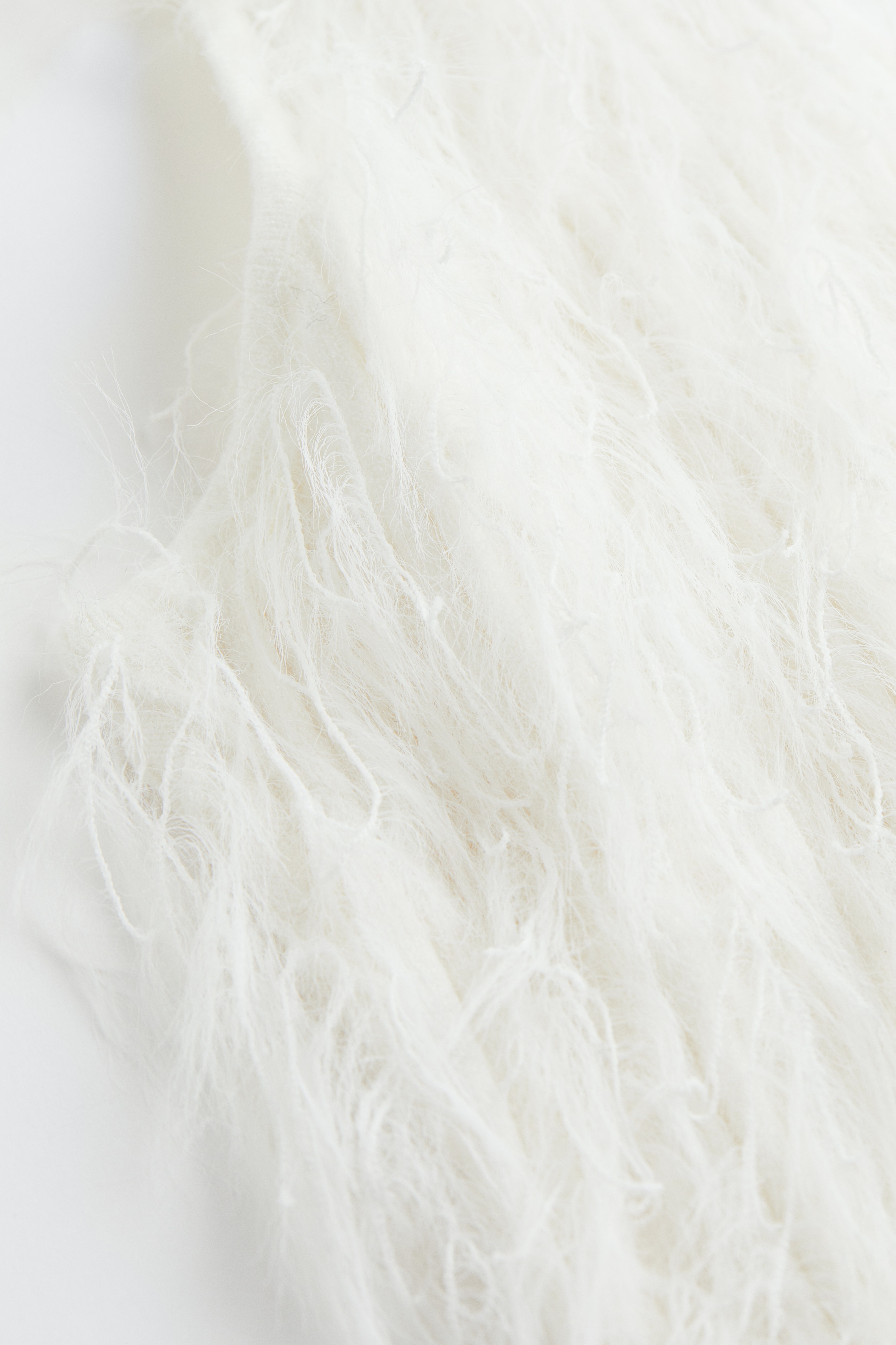 Fluffy fringe-knit top