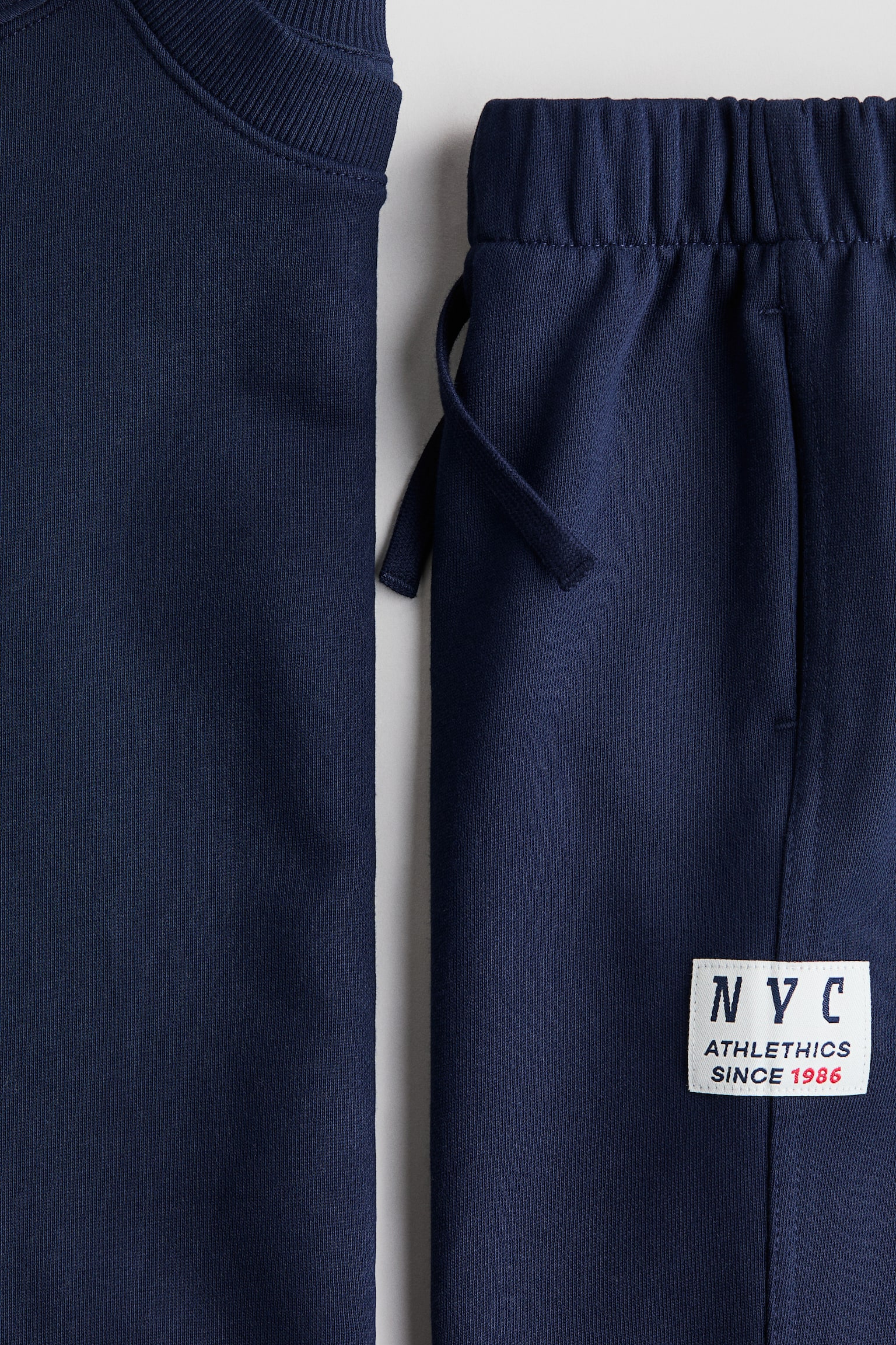 Dvodelna trenerka od duks materijala sa motivima - Mornarsko plava/Bež - 2