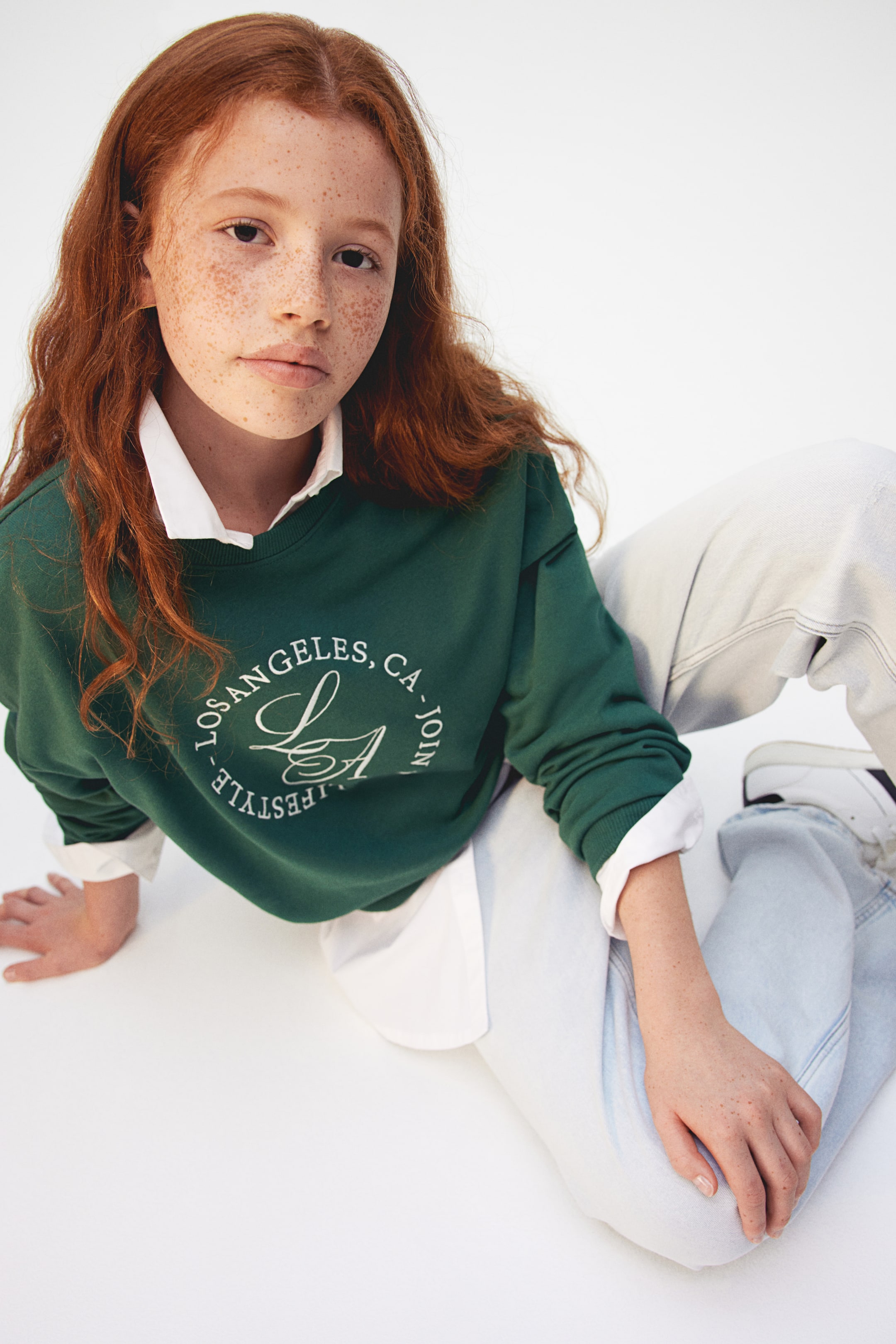 Motif-detail sweatshirt - Dark green/Los Angeles - Kids | H&M GB