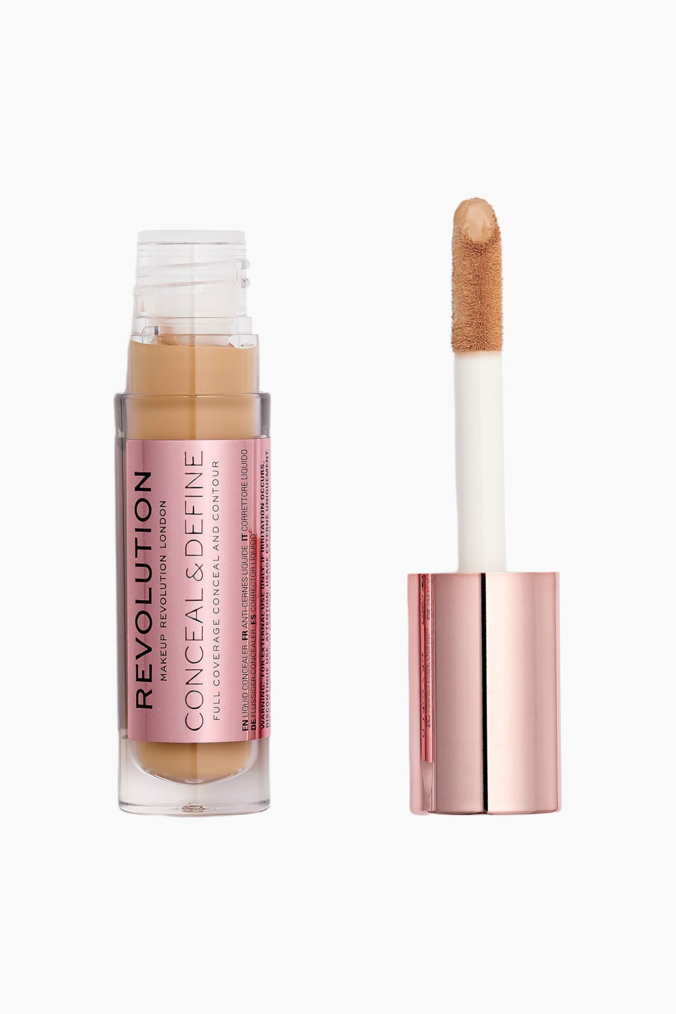 Visa större bild: En öppen, klar flaska med flytande concealer står upprätt och visar en medium-tan nyans samt en metallic rose gold-etikett. Bredvid flaskan står applikatorn, med en metallic rose gold-hatt, ett vitt skaft och en stor doe-foot-applikator täckt av concealern.