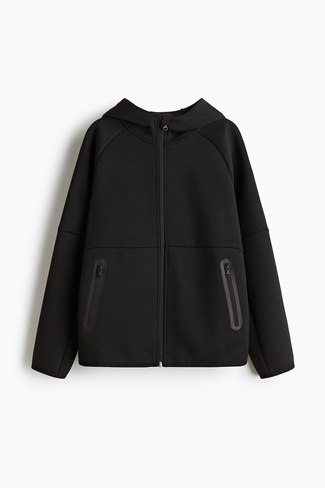 Fleece-lined sports hoodie with DryMove? is presenting its FRONT view. This black hoodie is featuring a full-zip closure, an attached hood, and two angled zippered pockets on the lower front. It is displaying raglan sleeves with smooth hems and cuffs. - 1