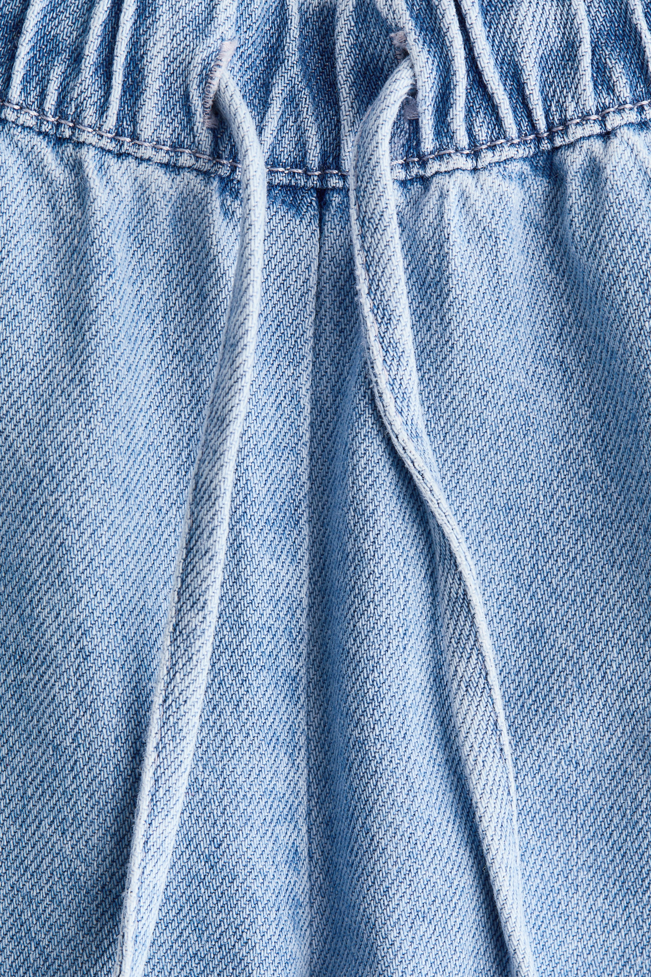 Pantalon MAMA en denim avec cordon de serrage