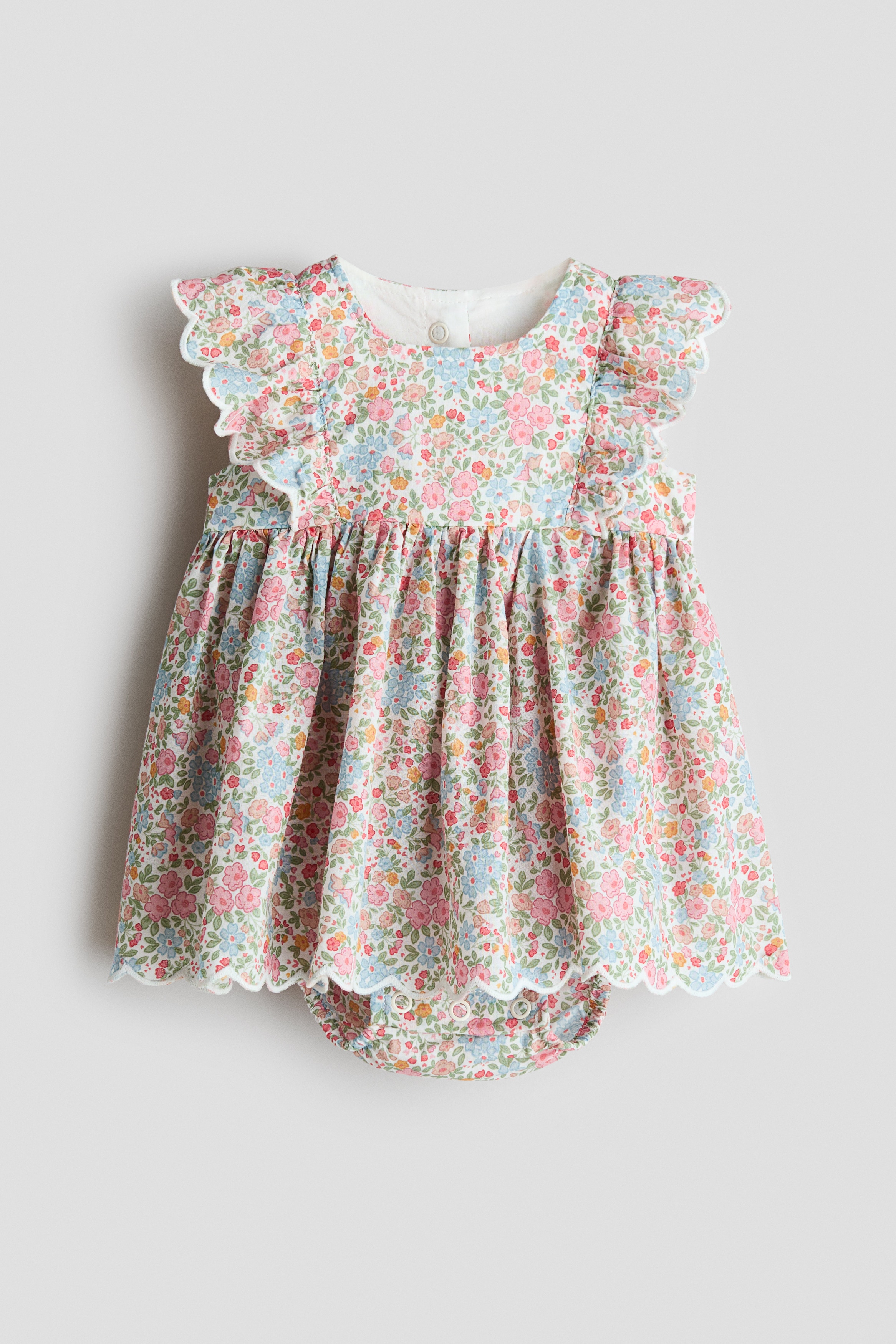 Váy bodysuit viền diềm nhún - Màu hồng/Hoa/Màu trắng