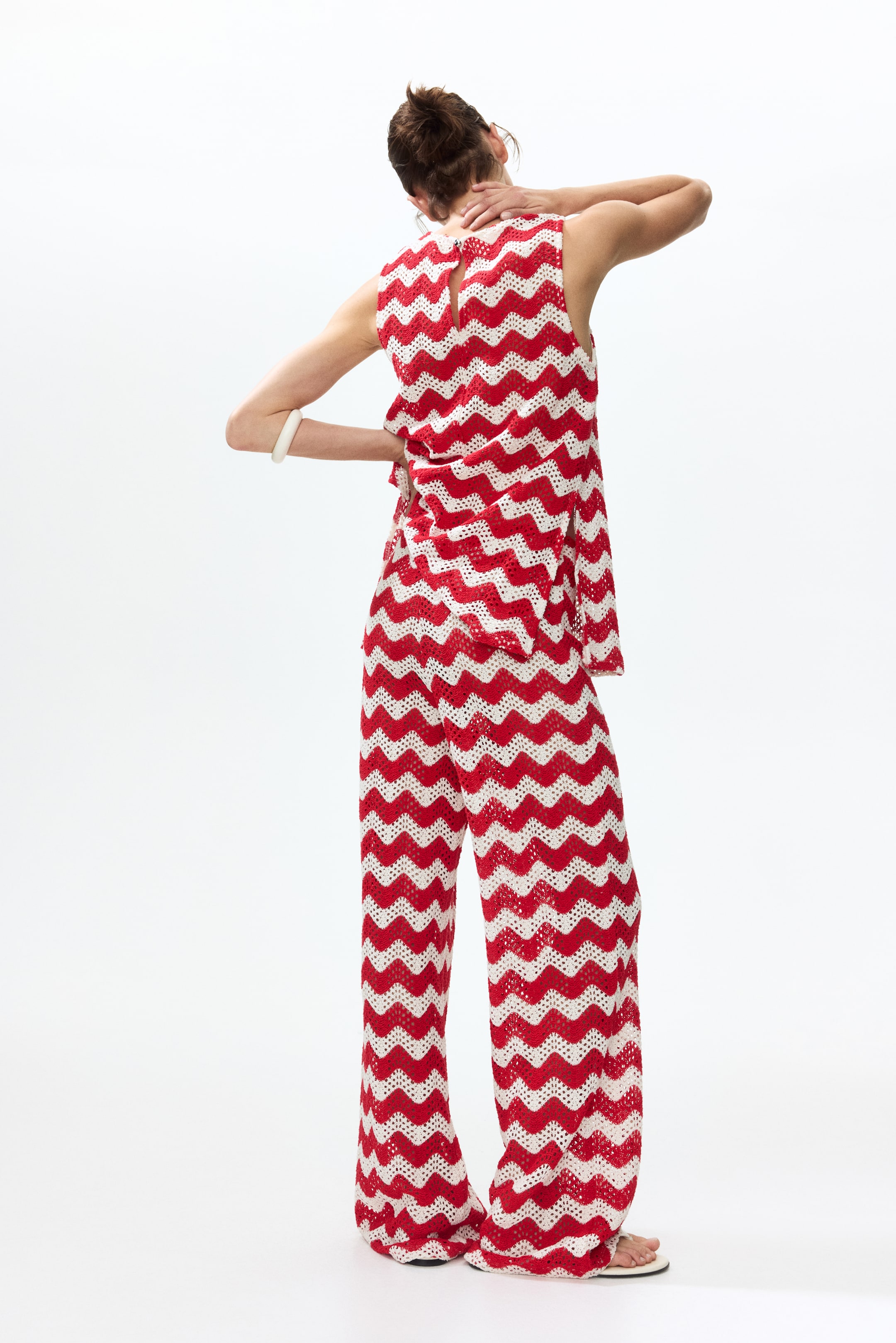 Pantalon en jersey jacquard façon crochet