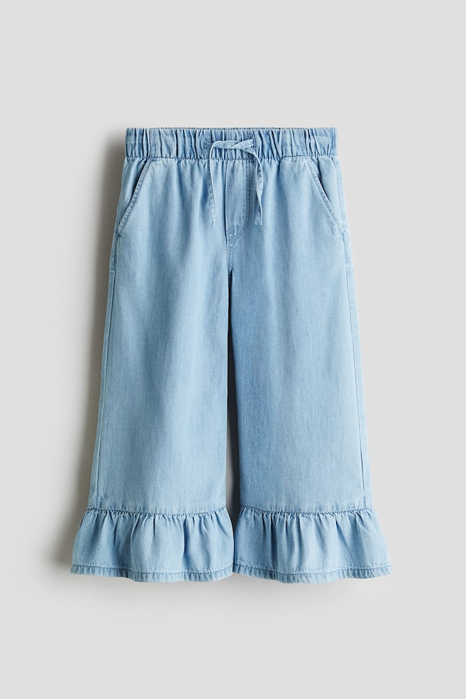 Cropped denim-look trousers - Light denim blue - 1