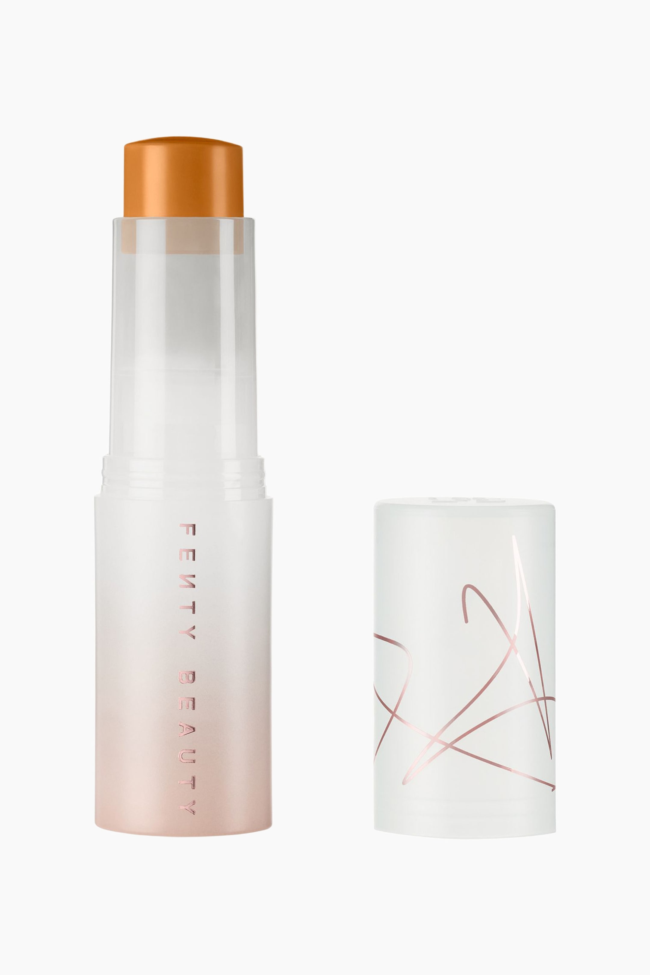 Visa större bild: Eaze Drop Blur + Smooth Tint Stick står upprätt bredvid sitt avtagna lock och visar upp en varm, solbrun makeupformula som är vriden upp ur en behållare med gradient från frostad till roséguld. Behållaren har vertikal metallisk märkning, medan det medföljande frostade vita locket pryds av abstrakt linjekonst i roséguld.