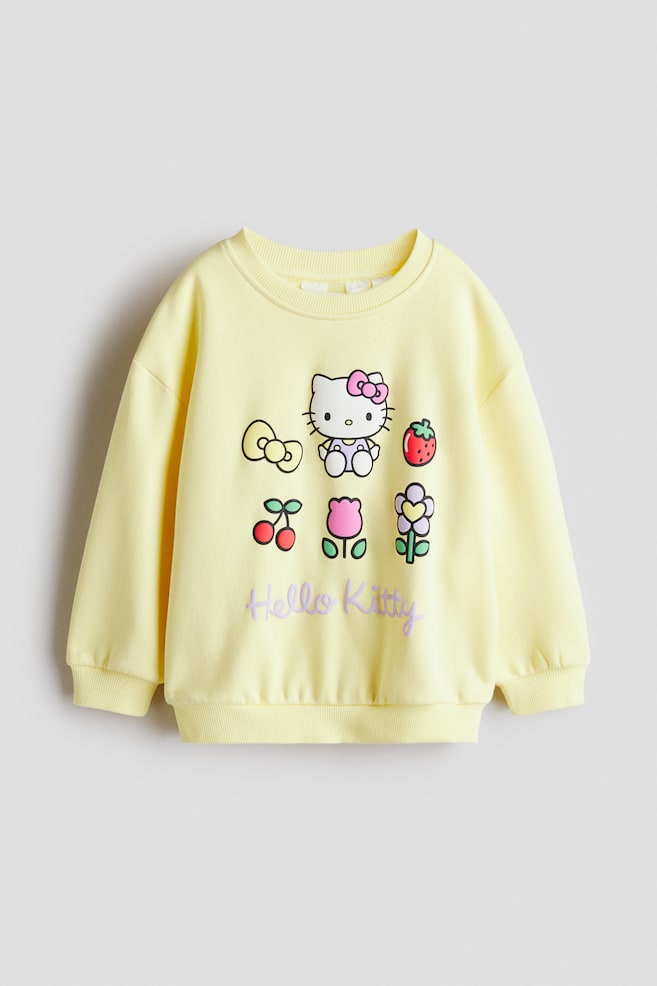 Sudadera con diseño - Amarillo/Hello Kitty/Blanco/Hello Kitty/Crema/Hello Kitty/Crema/Hello Kitty/Blanco/Peppa Pig/Gris jaspeado/Lilo y Stitch/Rosa/Lilo & Stitch/Azul claro/Hello Kitty/Azul claro/Frozen/Rosa/Hello Kitty/Blanco/Kuromi/Rosa/Peppa Pig/Rosa/Minnie Mouse/Turquesa/Casa Muñecas de Gabby - 1