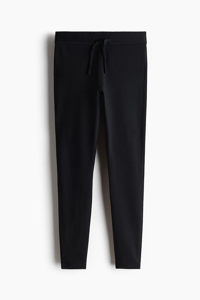 Wärmende Sportleggings mit ThermoMove™ - Schwarz - 1