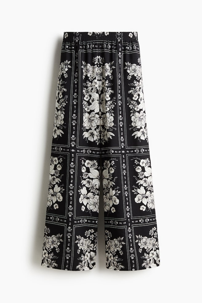 Wide pull-on trousers - Black/Floral - 1