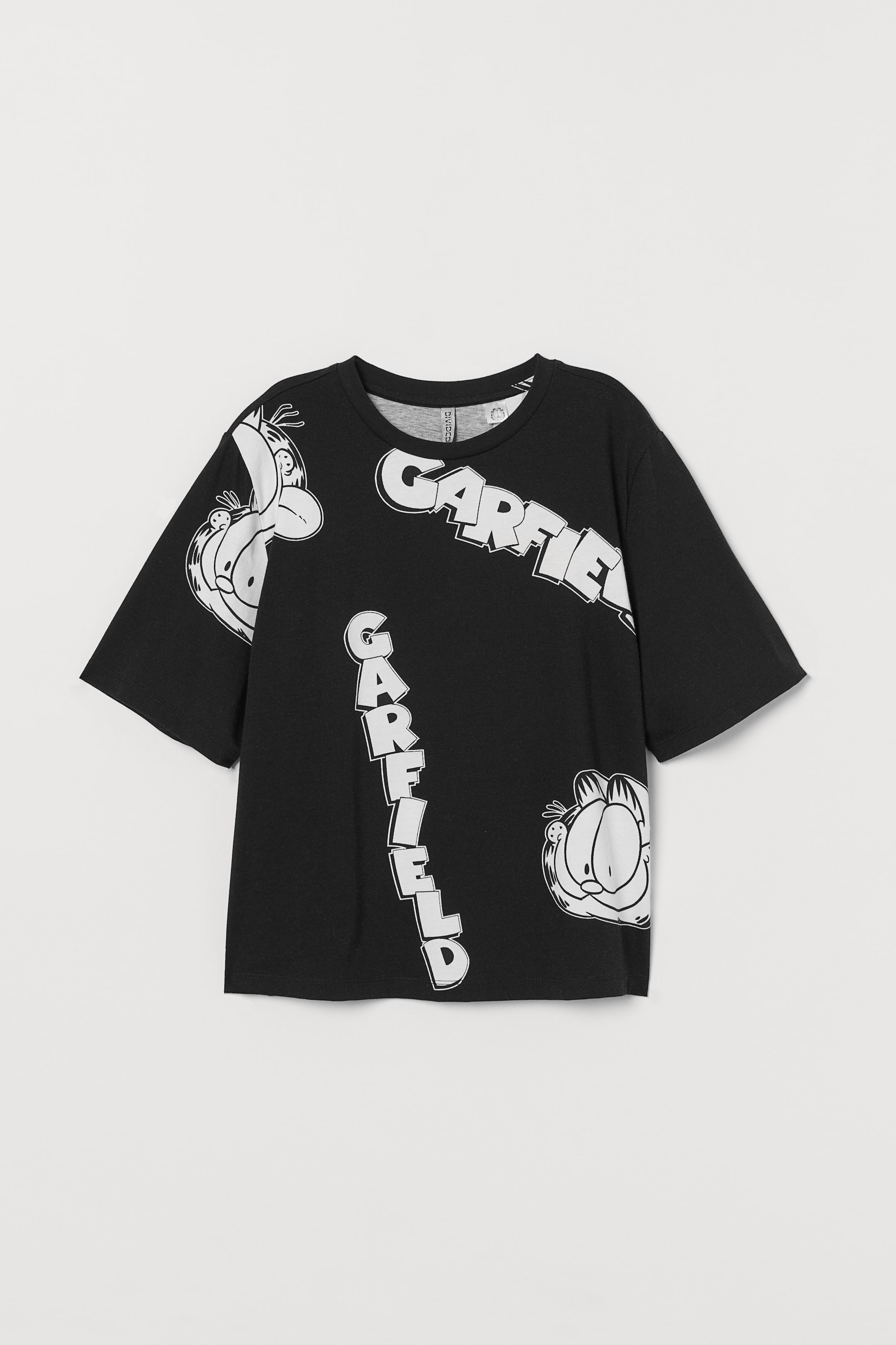 Oversized T-shirt with a motif - Round neck - Short sleeve - Black ...