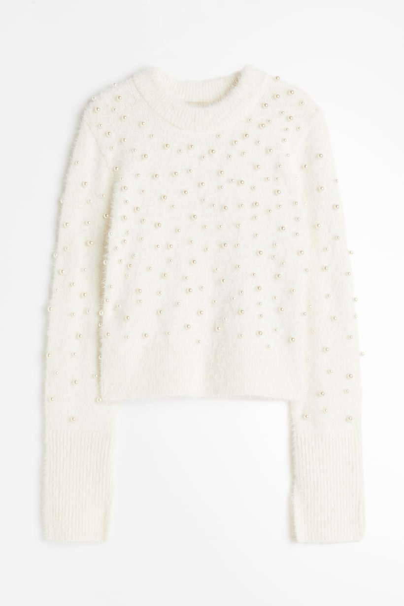 Le pull noir avec sequins : Femme Actuelle Le MAG