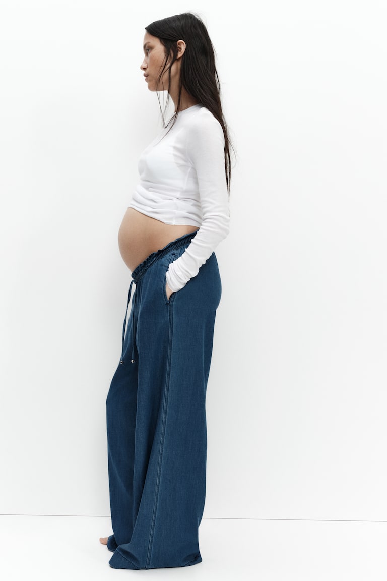 MAMA Široke pantalone s nabranim strukom