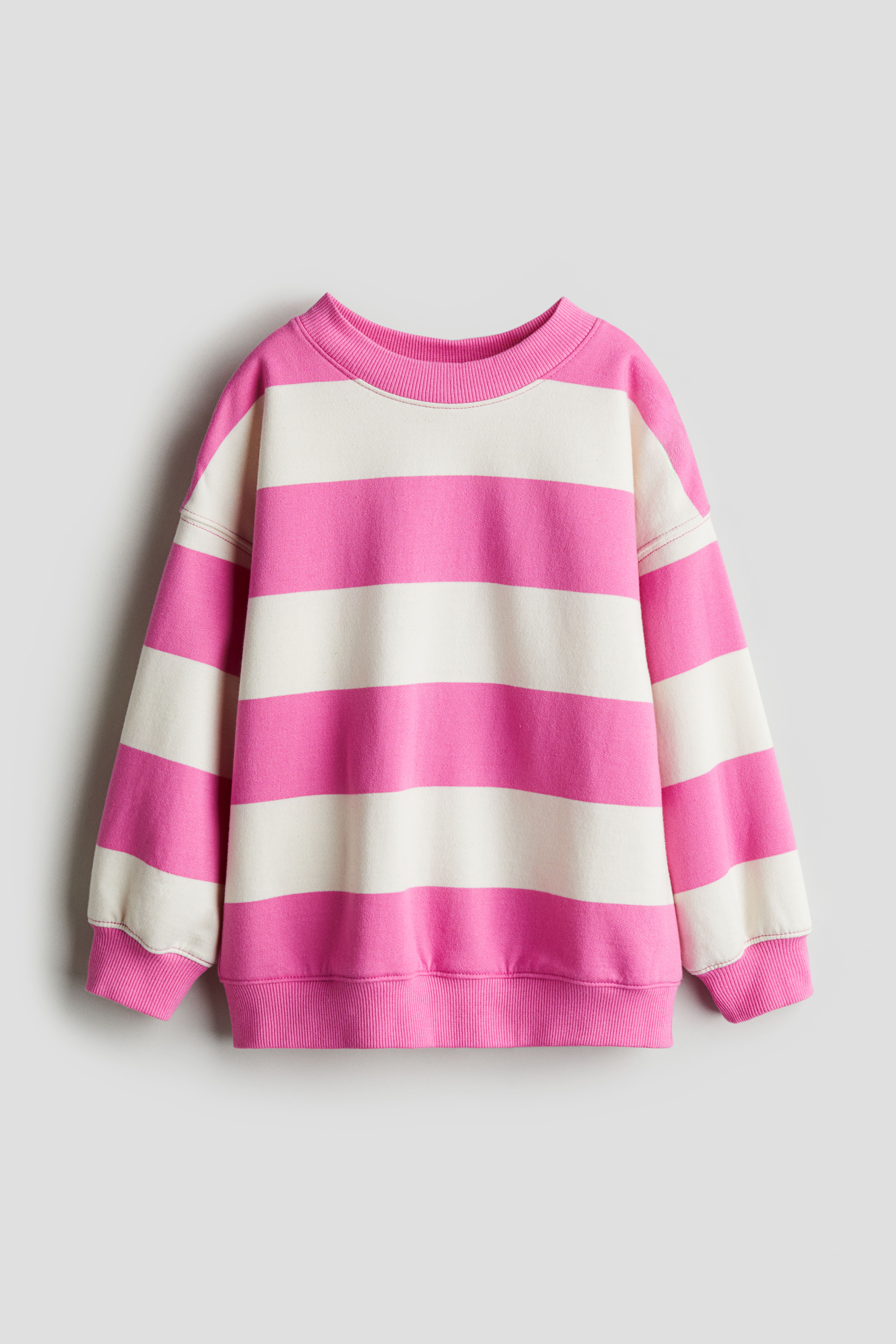 1980s nylon pullover in baby good pink and white