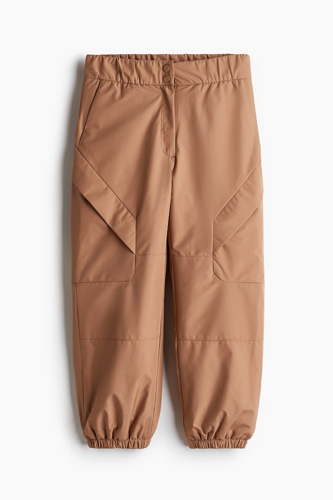 Water-repellent padded trousers with ThermoMove™ - Dark beige - 1